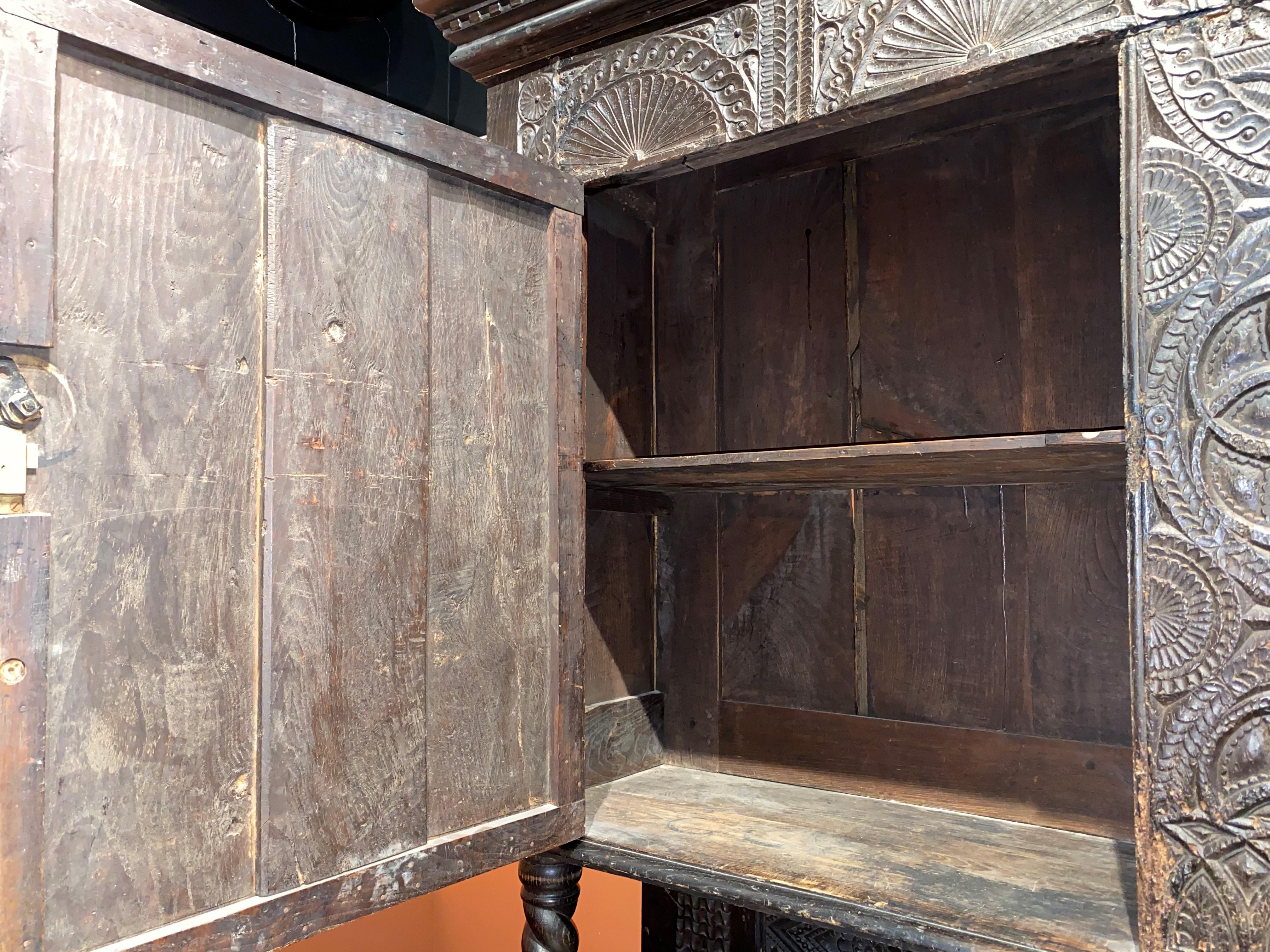 Restored 17th C Continental Two Part Cupboard with Exceptional Carving For Sale 10
