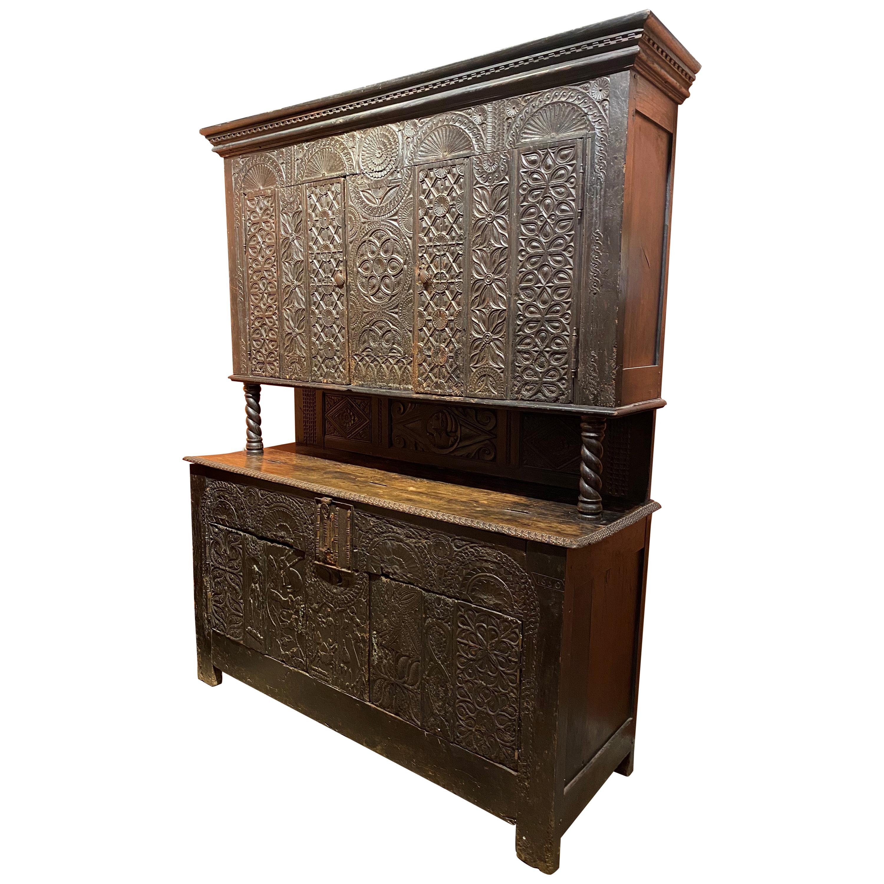 Restored 17th C Continental Two Part Cupboard with Exceptional Carving For Sale