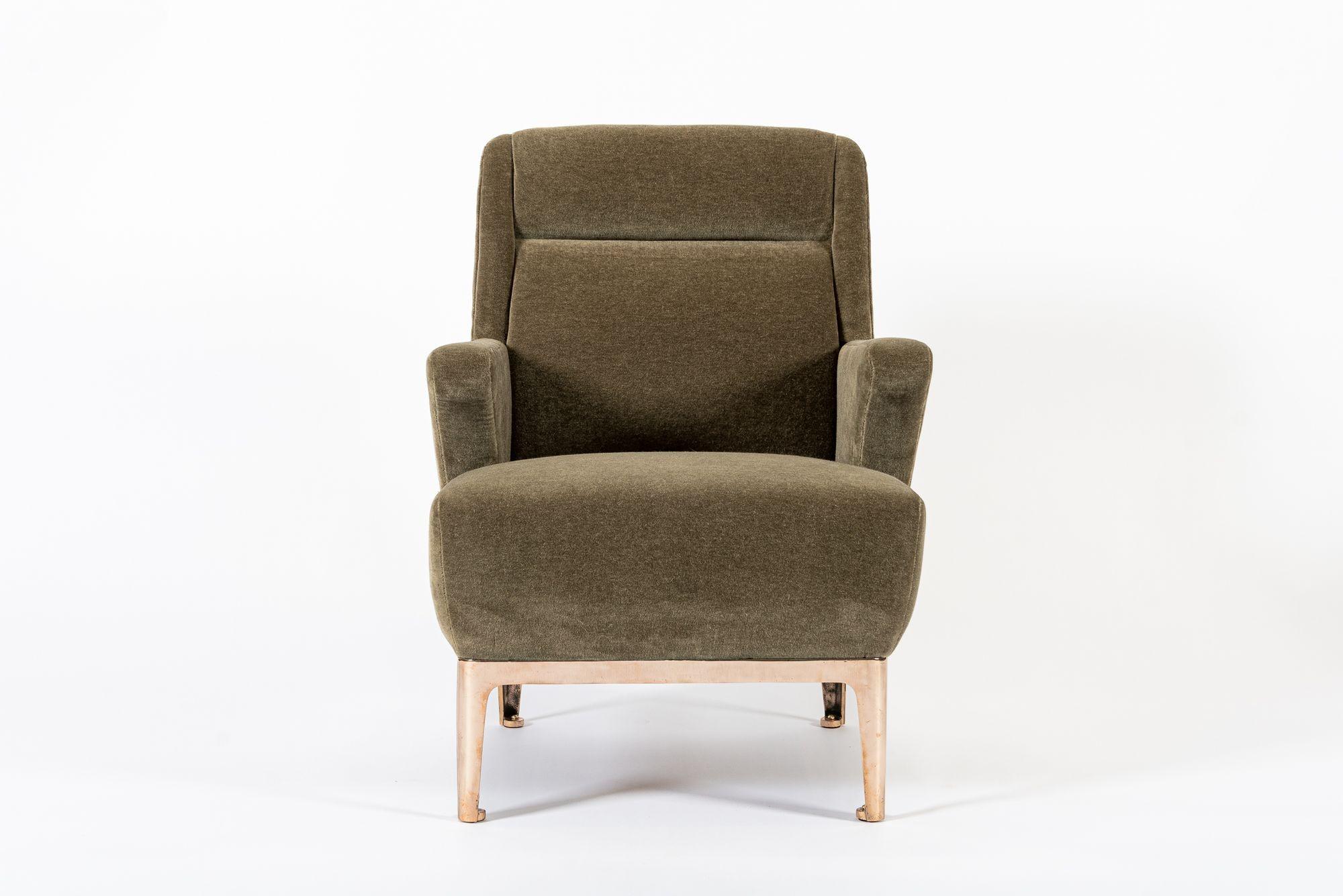 Note: We have additional matching lounge chair and sofa sets undergoing restoration and can offer chairs and sofas in multiples and with custom upholstery options. Please reach out for further details.

This expertly-crafted, elegant mohair lounge
