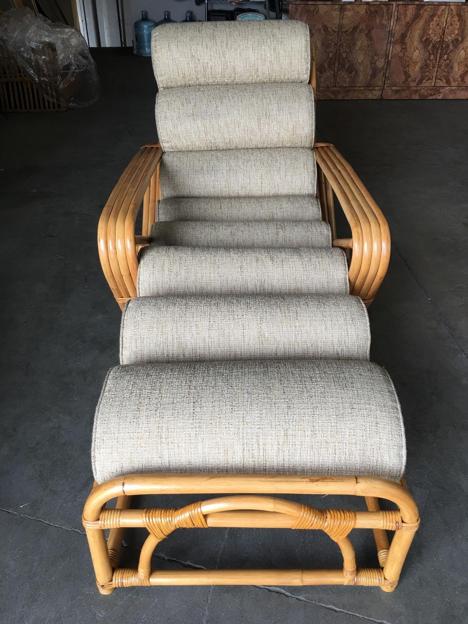 Relax in this 2-piece vintage restored rattan chaise lounge chair. The ottoman attaches to extend the armchair into a chaise lounge and features a soft and comfortable cushion top. The 4-strand arm style is patterned after the same style made famous