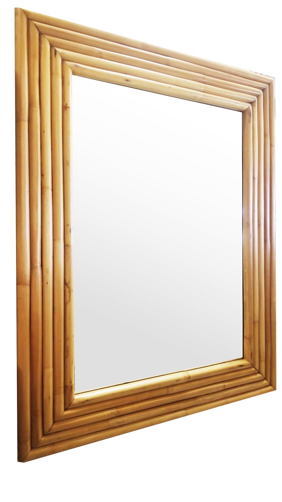 Original 1948 new-stock rattan frame from the unused stock of Tropical Sun Rattan Company of Pasadena. The Mirror features 7-strand stacked rattan frame with a 28