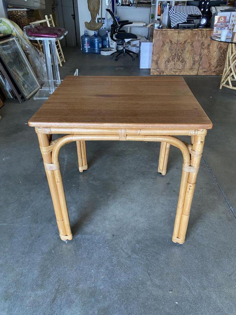 Vintage 1940s rattan Games table with wonderful arch base and a beautiful medium stained mahogany top. This table is a great match for mid-century rattan and Paul Frank pieces.
Restored to new for you.
All rattan, bamboo, and wicker furniture has