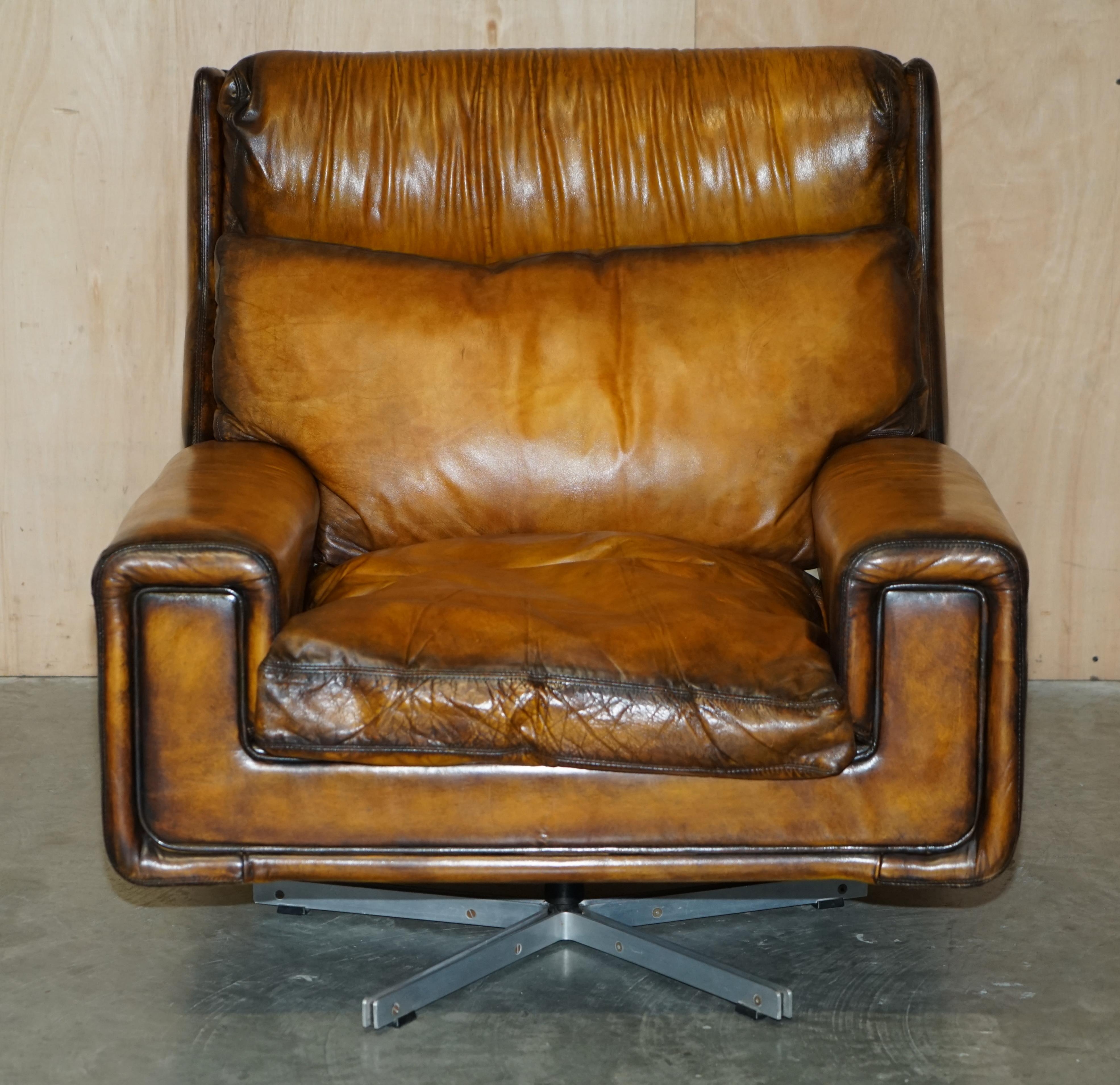 English Restored 1970s Whisky Brown Leather Swivel Lounge Armchair & Ottoman Part Set For Sale