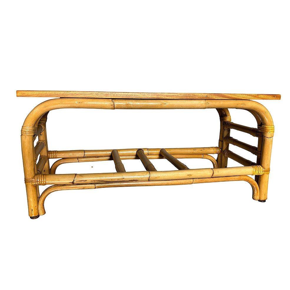 This beautifully restored Paul Frankl-inspired staple base coffee table with large arches forming a double staple shape base much like the designs made famous by Paul Laszlo. The table features a mahogany wood top and fancy wicker wrappings along