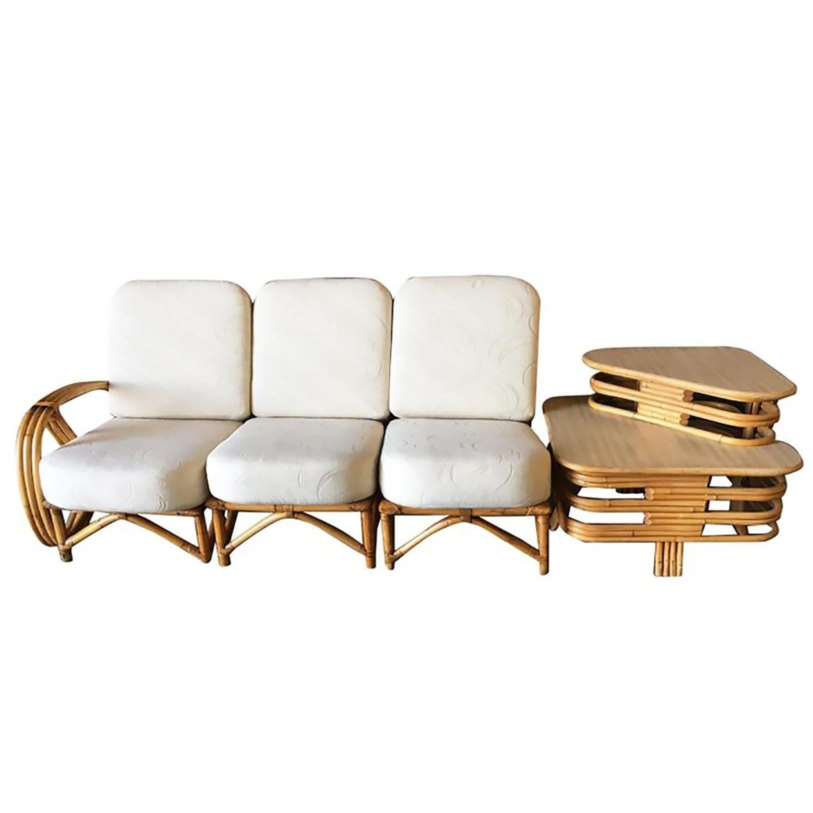 This rare find is a 3-strand 3/4 pretzel arm rattan 3-seat sectional sofa paired with a spacious 2-tier side table, seamlessly fitting on the armless side of the sofa. Its distinctive Mid-century design boasts unique wicker wrappings and an elegant