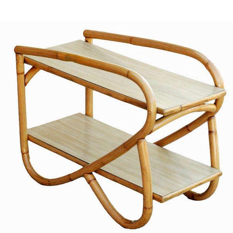 Beautifully restored Frankl style pair of mid-century 3/4 Pretzel rattan side tables with 2-tier Formica tops, all meticulously refinished to highlight the natural rattan’s warmth and durability. It is perfect for creating a stylish and cozy