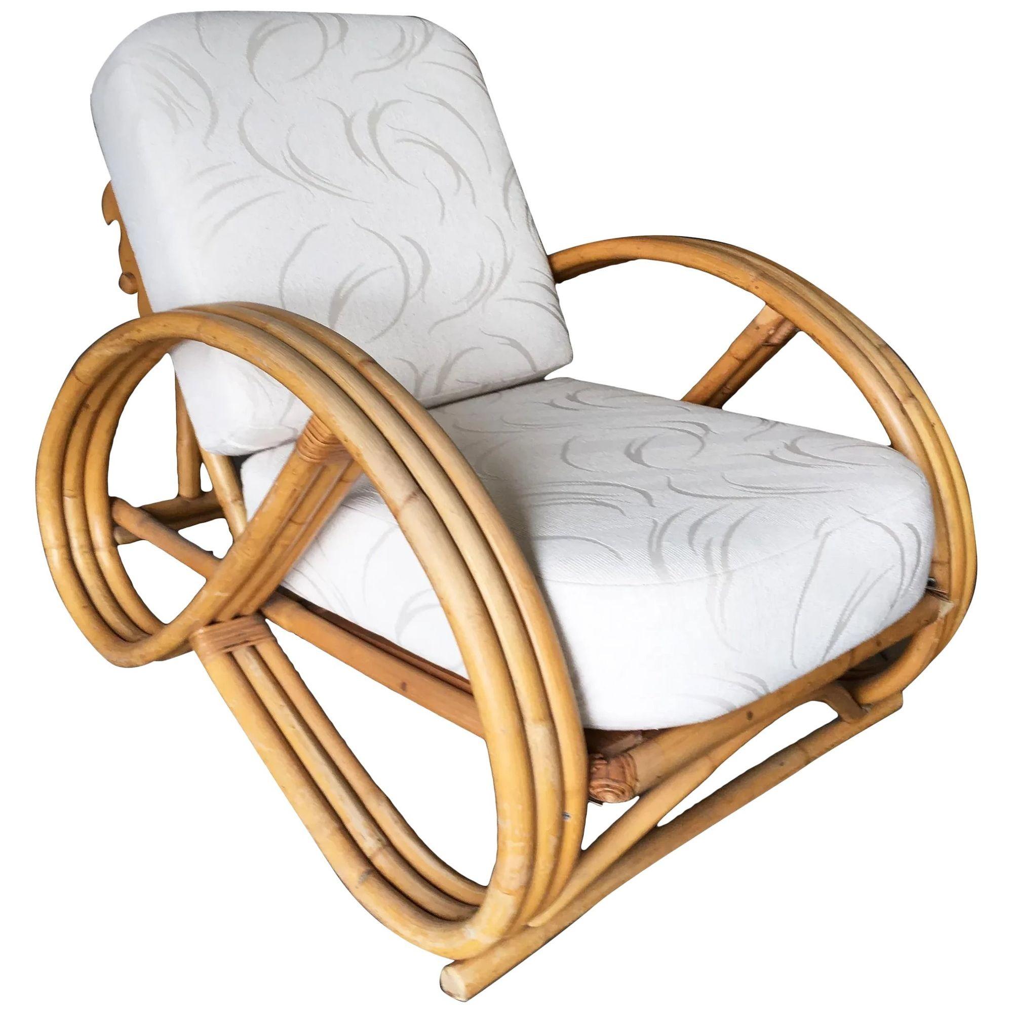 Mid Century 3/4 round pretzel arm rattan lounge chair with three-strand round pretzel arms and an 