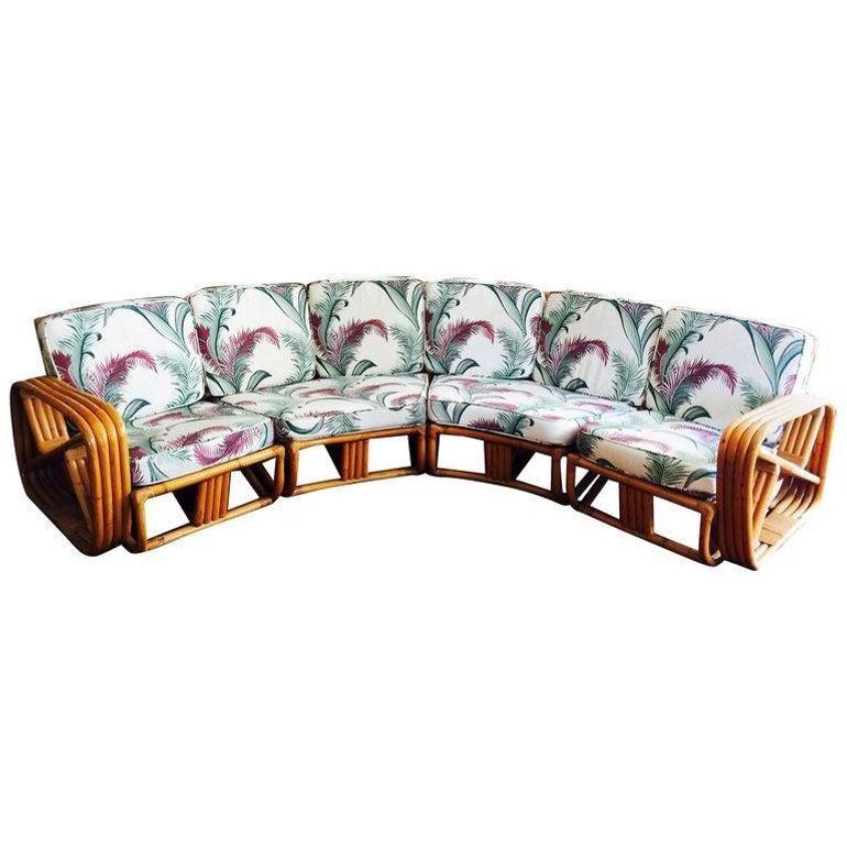 Original Mid-Century Four-strand square pretzel rattan Corner Sectional sofa with six seats. This sofa features a geometric pattern rattan base with four-strand square pretzel arms and is divided into four sectionals, two end pieces that each fit