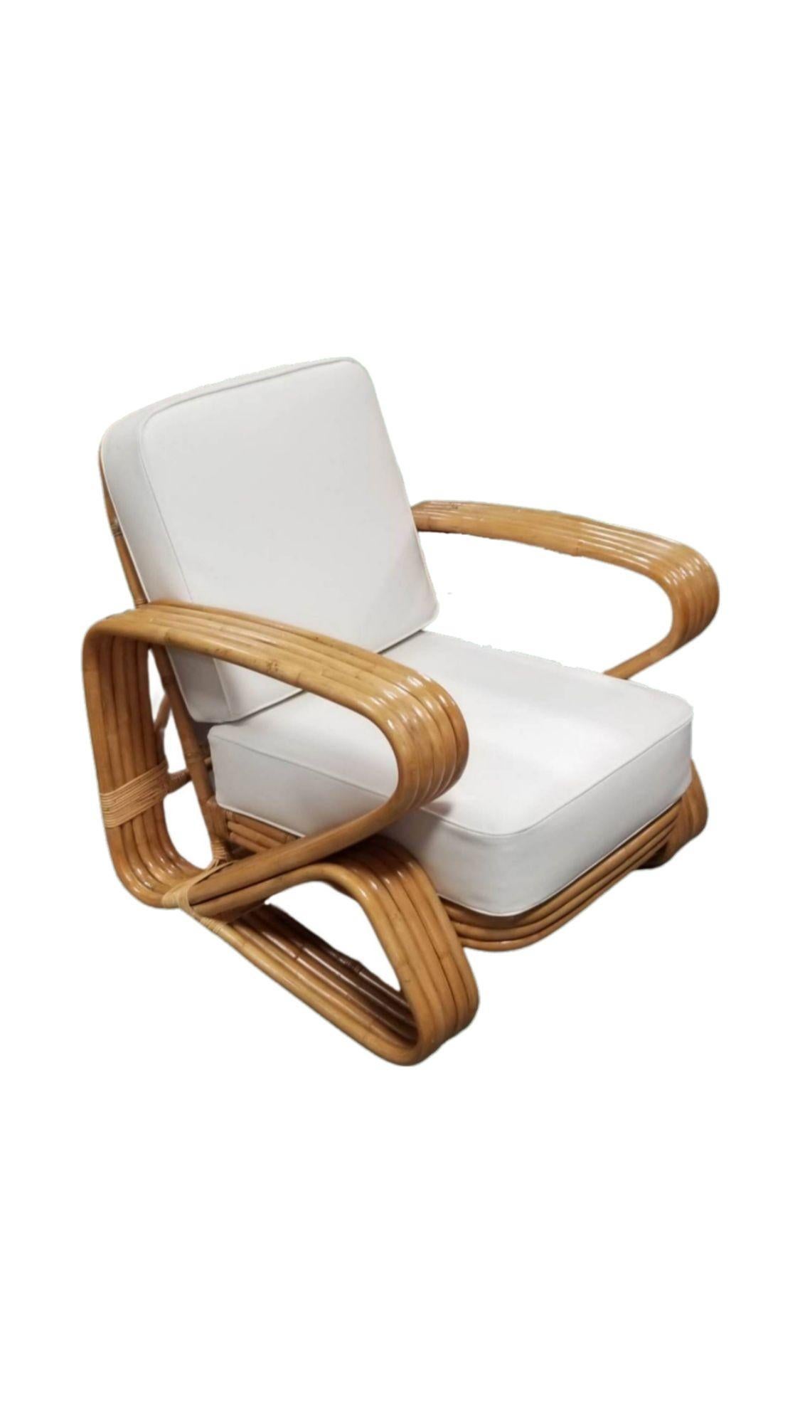 Rare Five-strand 'Double Triangle' lounge chair with a floating seat featuring large oversized arms.

1950, United States

We only purchase and sell only the best and finest rattan furniture made by the best and most well-known American
