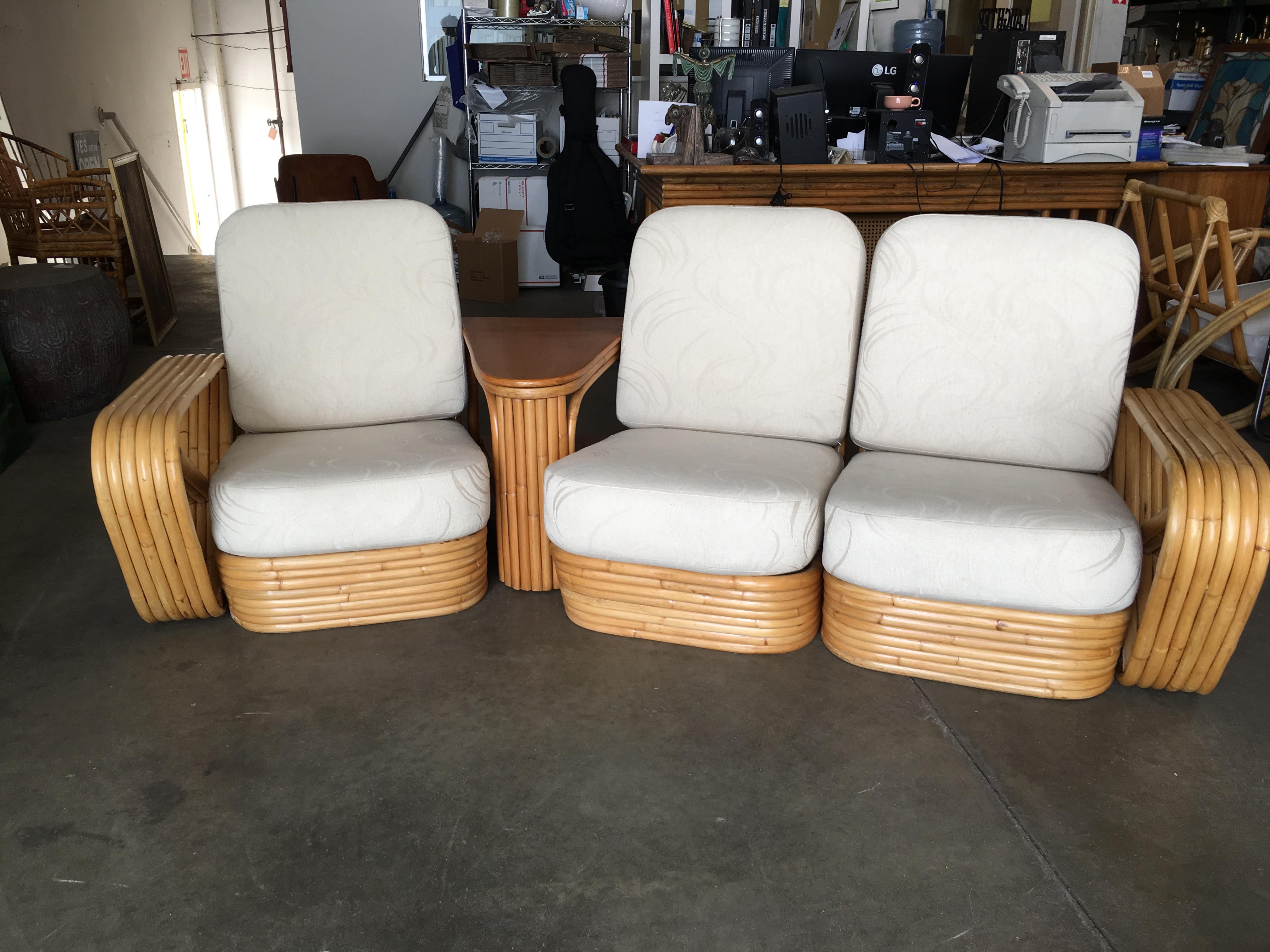Rare Square Pretzel rattan 3 seater sectional sofa with Paul Frankl inspired design featuring 6 strand rattan arms and Stacked pole base. Comes with two tier rattan side table with can be configured in several arrangements.

Sofa: 32in. H x 80in. W