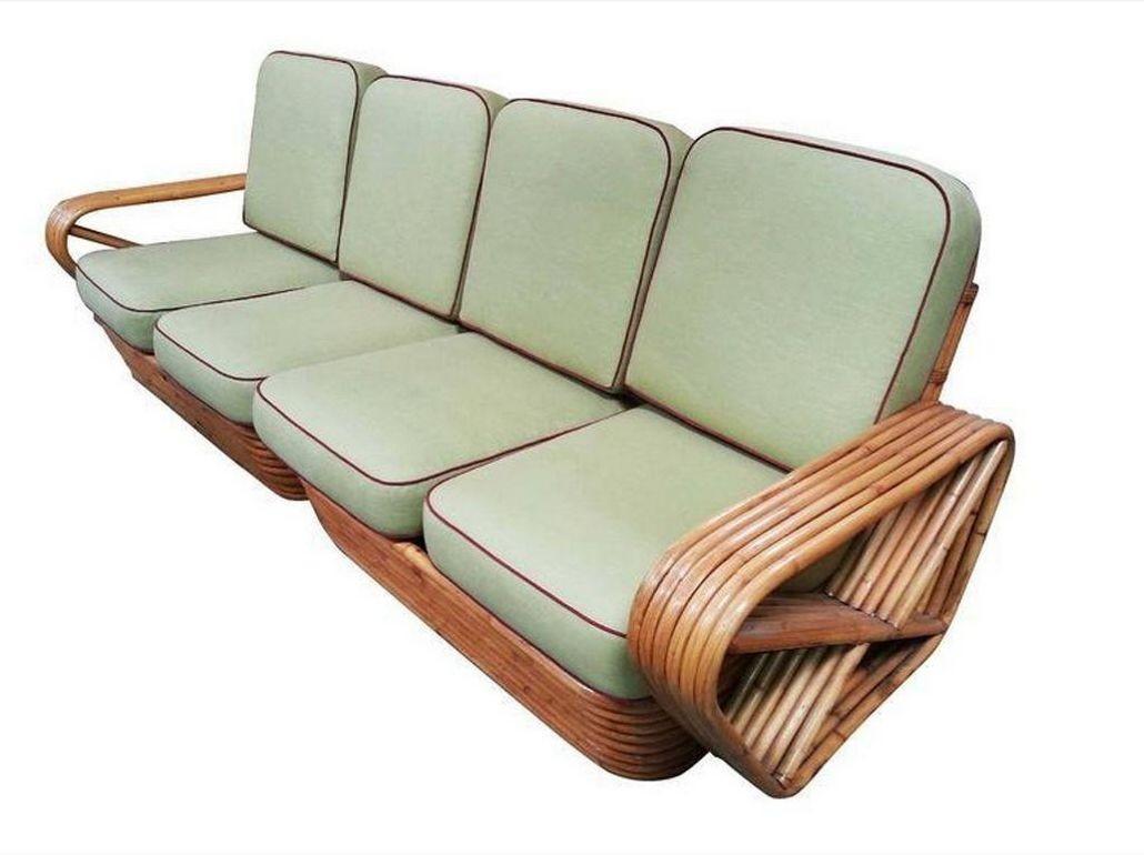 Square pretzel rattan sectional sofa designed by Paul Frankl. This sofa features a stacked rattan base with six-strand square pretzel arms and is divided into two pieces making a four-personal sectional.

1930, United States

We only purchase and