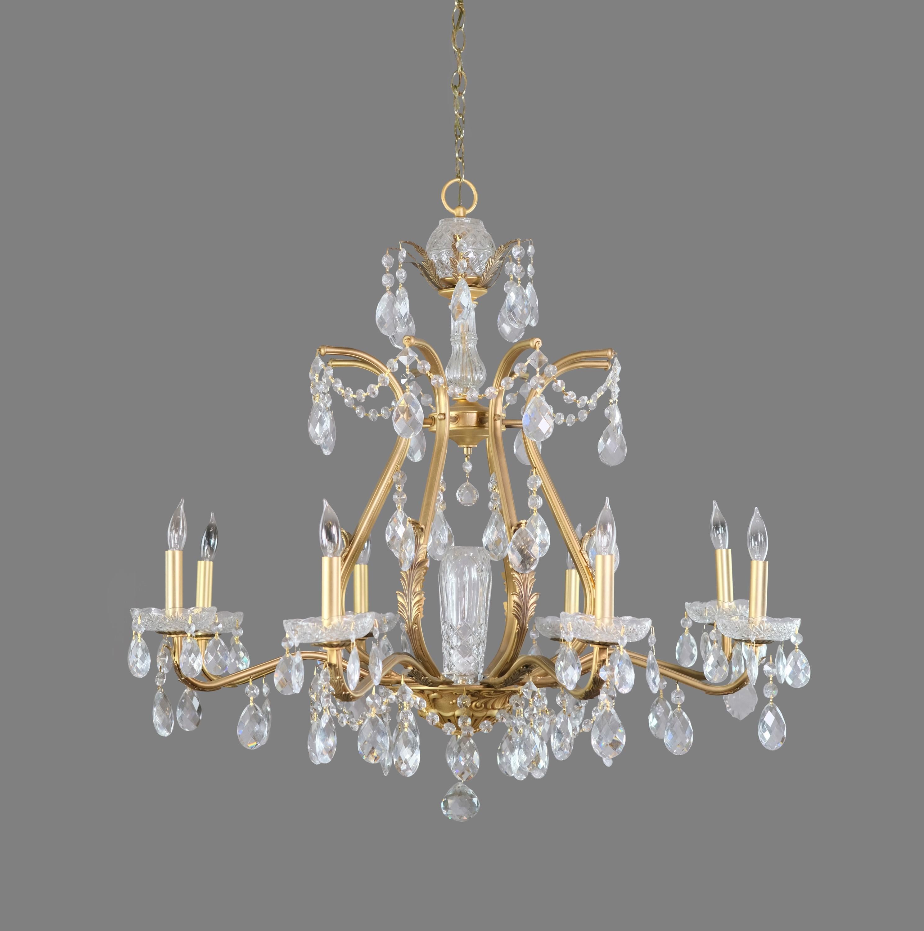 Restored Early 20th century gilt chandelier. Features eight arms dripping with crystals. Cleaned and rewired. Please note, this item is located in one of our NYC locations.