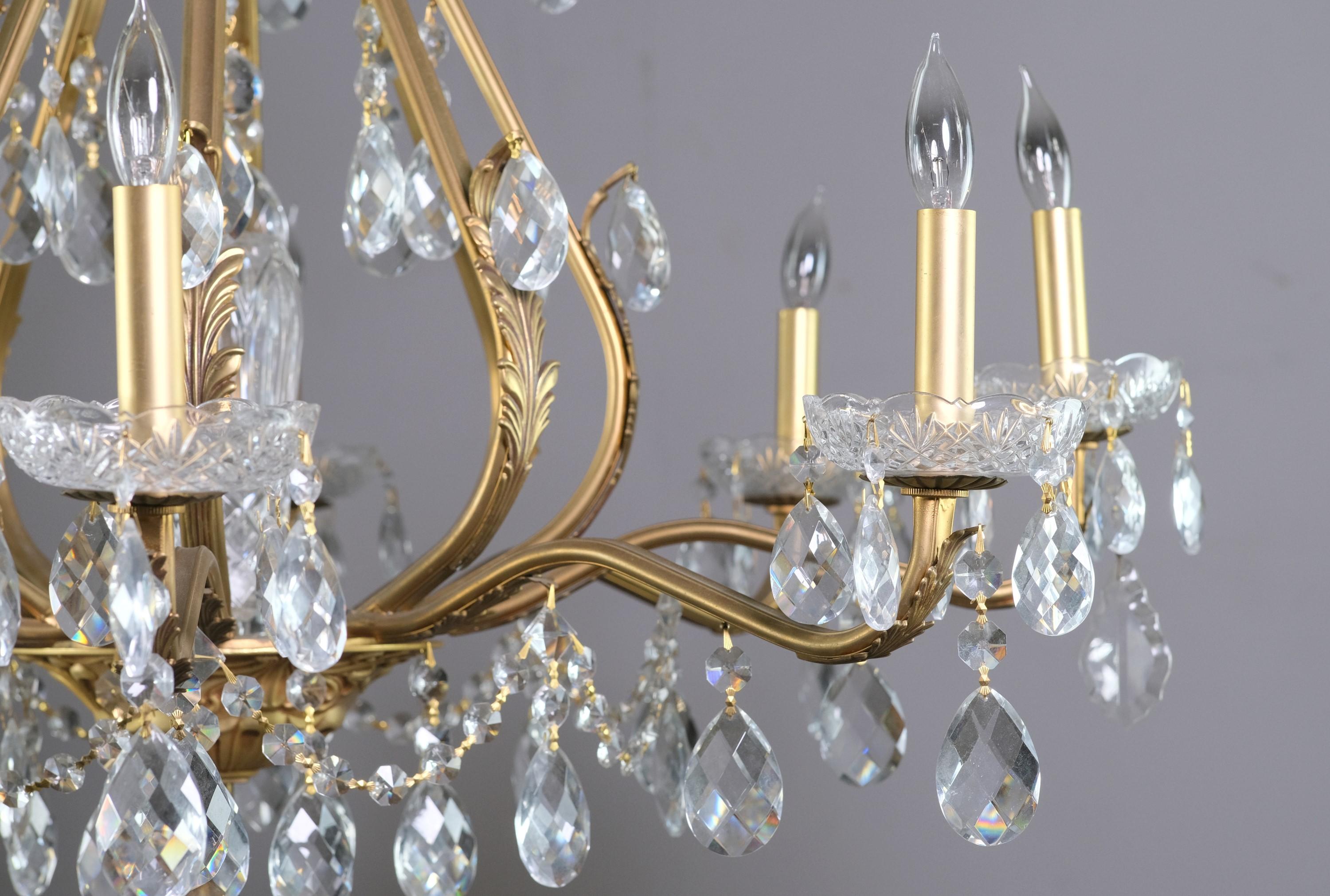 American Restored 8 Arm Crystal and Gilt Chandelier For Sale