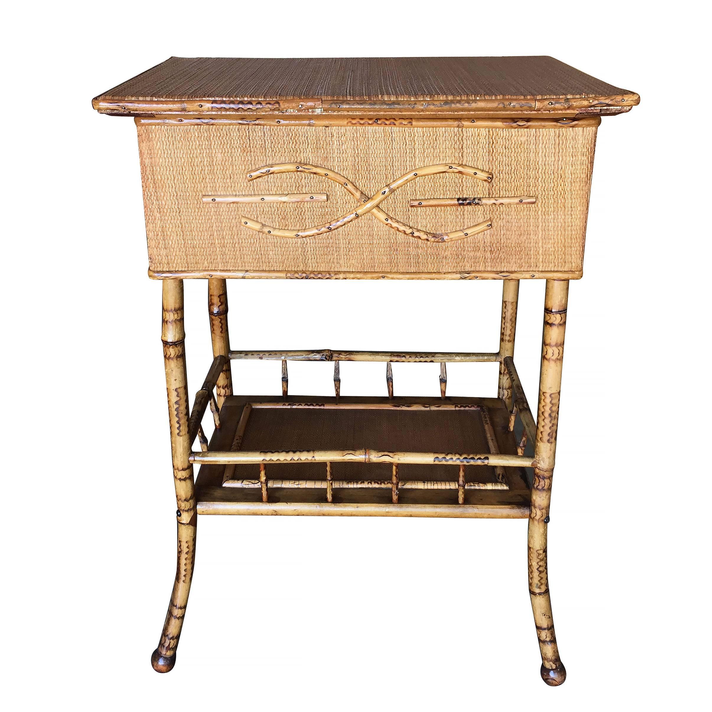 Antique tiger bamboo pedestal side table with rice mat top with flip-open lid storage and a secondary bottom shelf.
1900, USA
We only purchase and sell only the best and finest rattan furniture made by the best and most well-known American designers