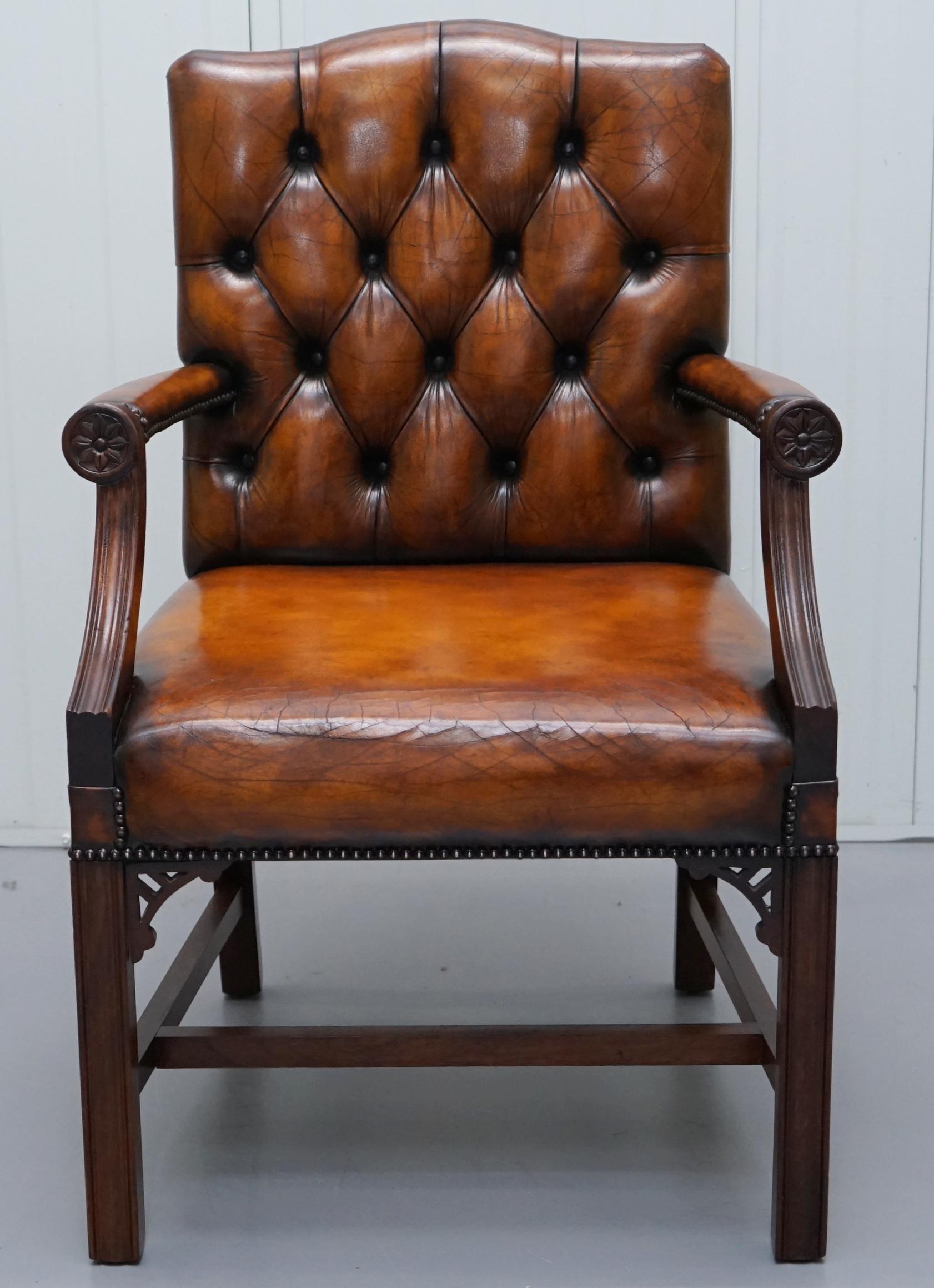 We are delighted to offer for sale this stunning vintage fully restored hand dyed aged brown leather Gainsborough carver armchair with Thomas Chippendale style fret work carving

A very good looking and well made armchair, there are allot of