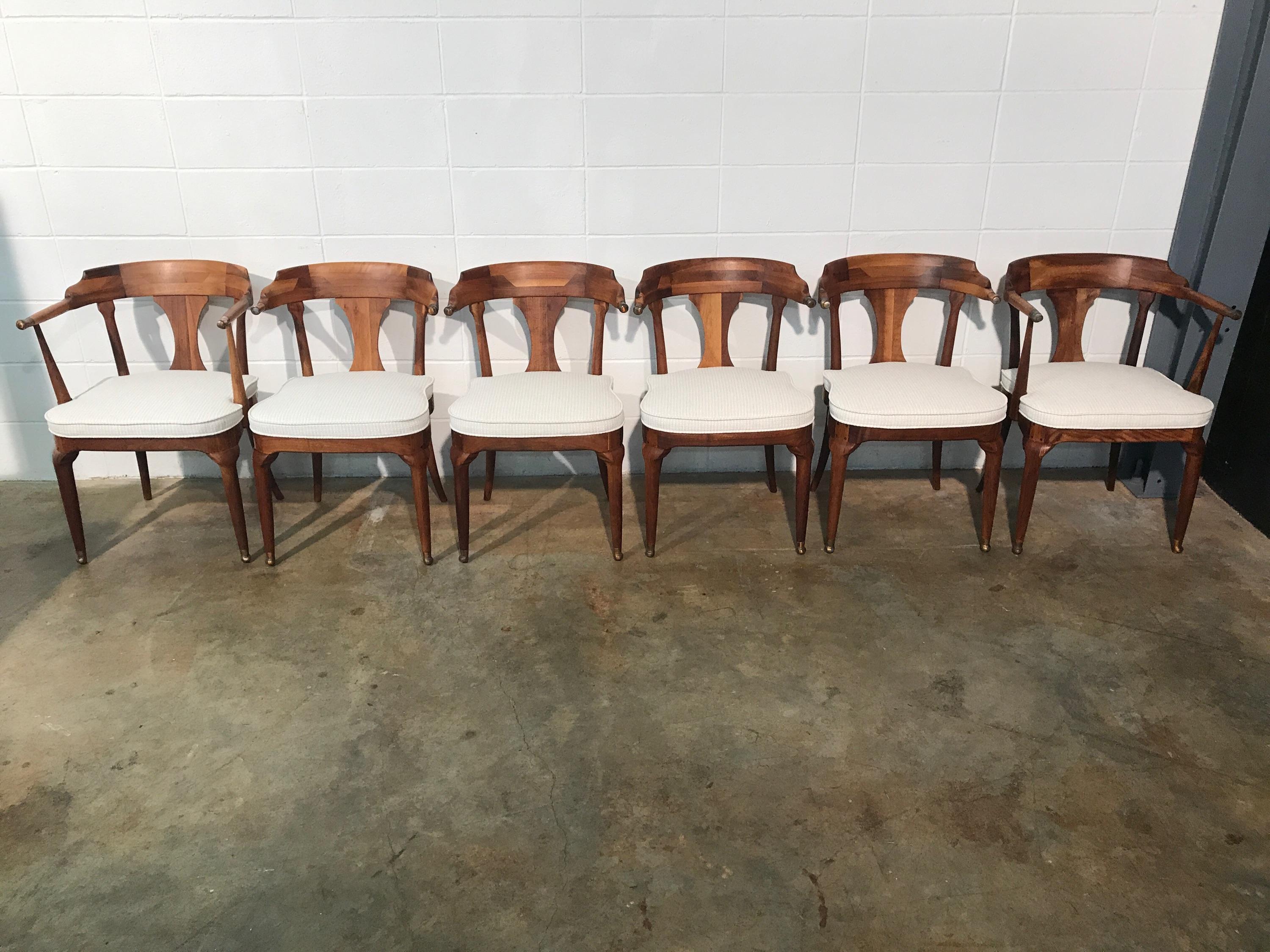 Restored and unusual midcentury dining chairs, set of six
These dining chairs are simply stunning. They have an unusual design and exceptional construction similar to that of a studio craft chair. They have been restored including being completely