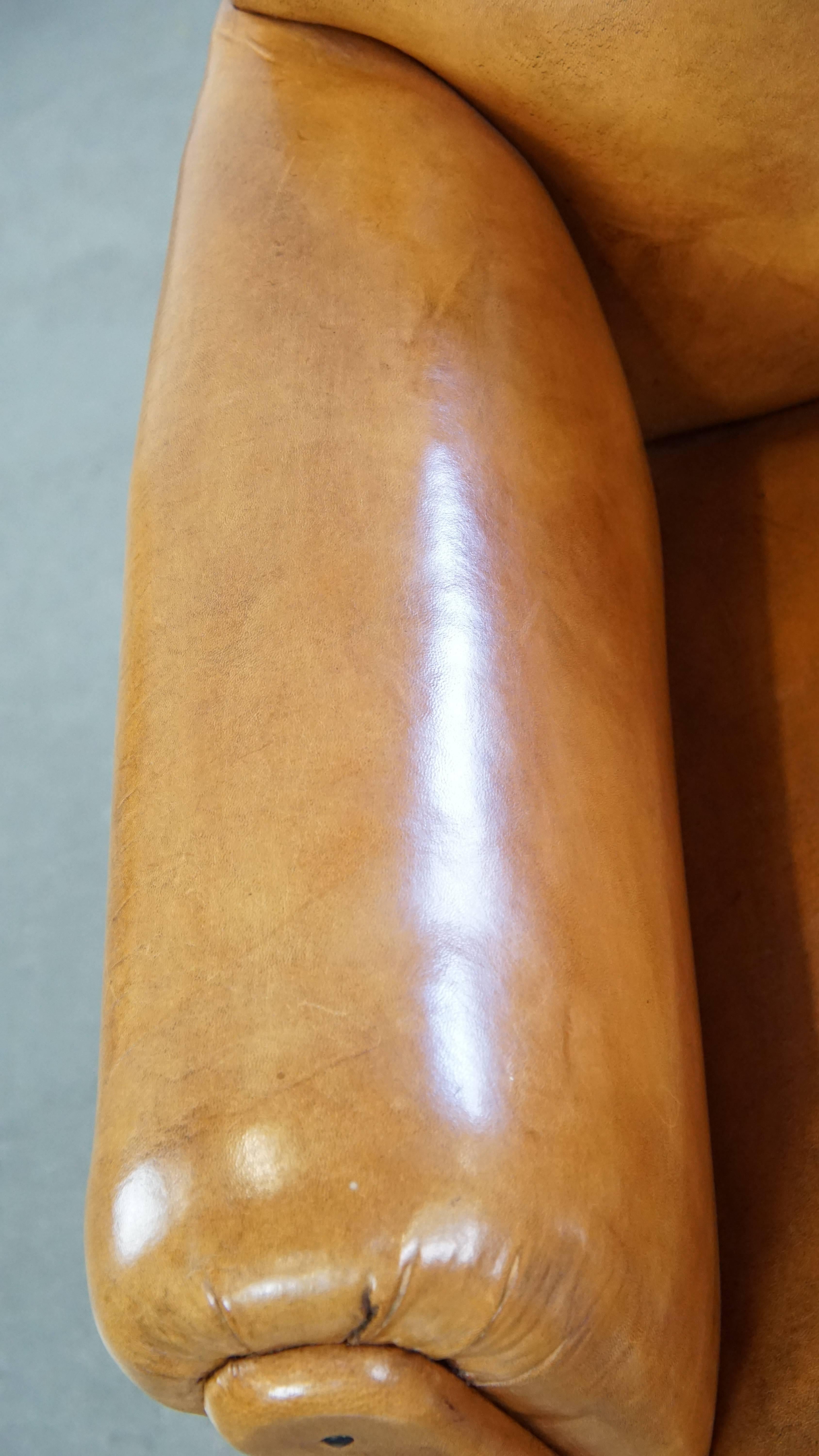 Restored antique Art Deco sheepskin armchair with correct seating comfort For Sale 1