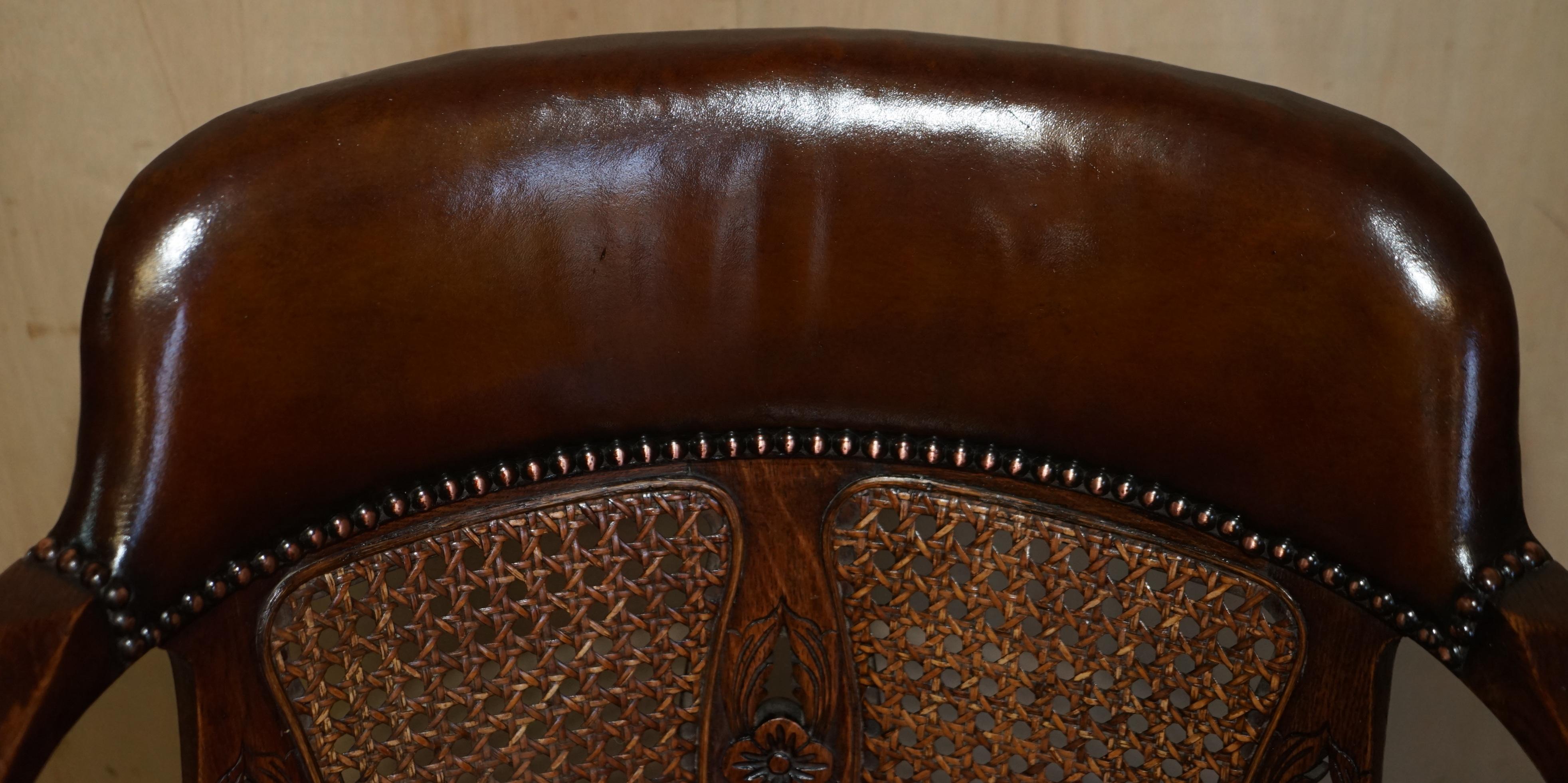 Hand-Crafted RESTORED ANTIQUE CIRCA 1880 BERGERE & BROWN LEATHER BARREL BACK CAPTAiNS CHAIR For Sale