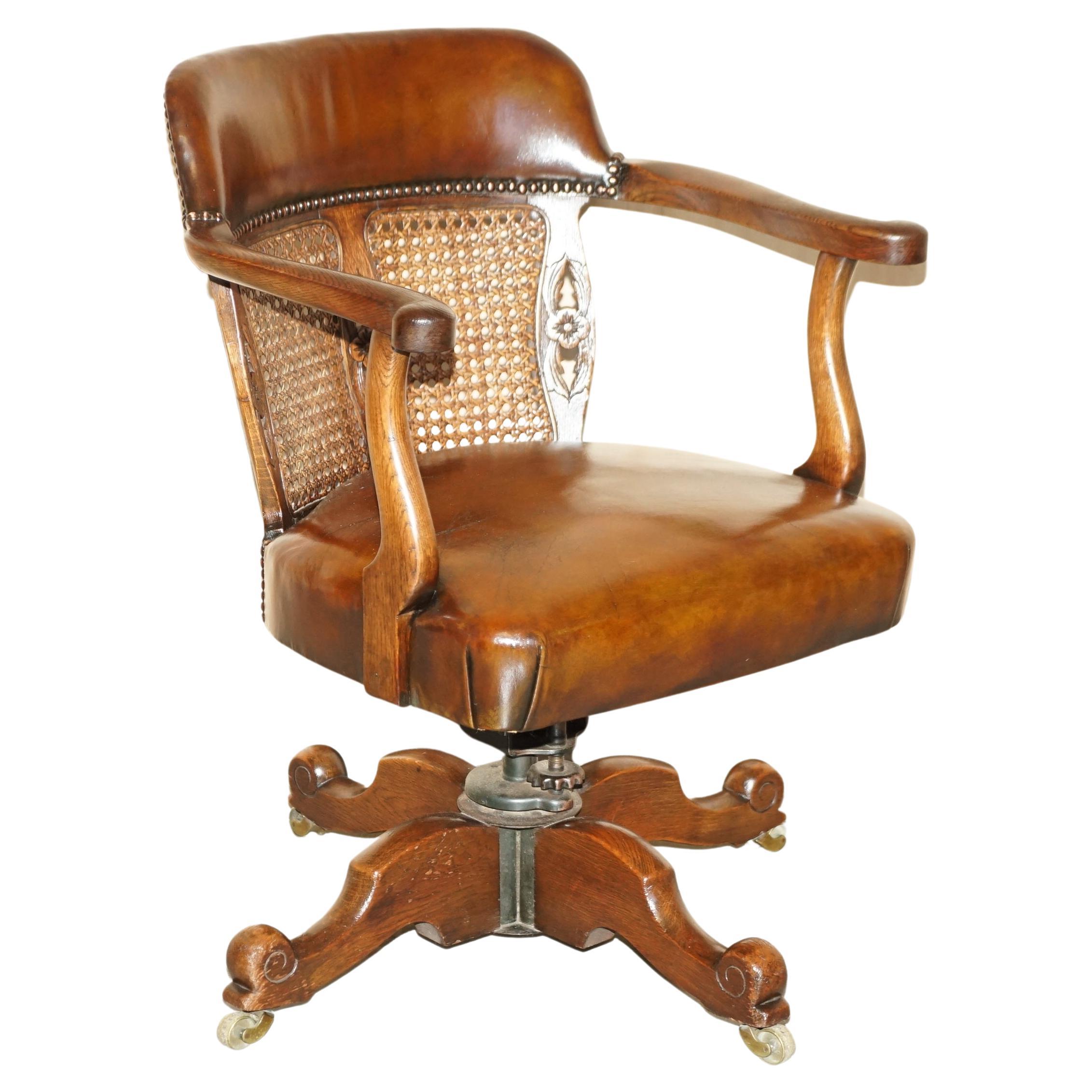 RESTORED ANTIQUE CIRCA 1880 BERGERE & BROWN LEATHER BARREL BACK CAPTAiNS CHAIR For Sale