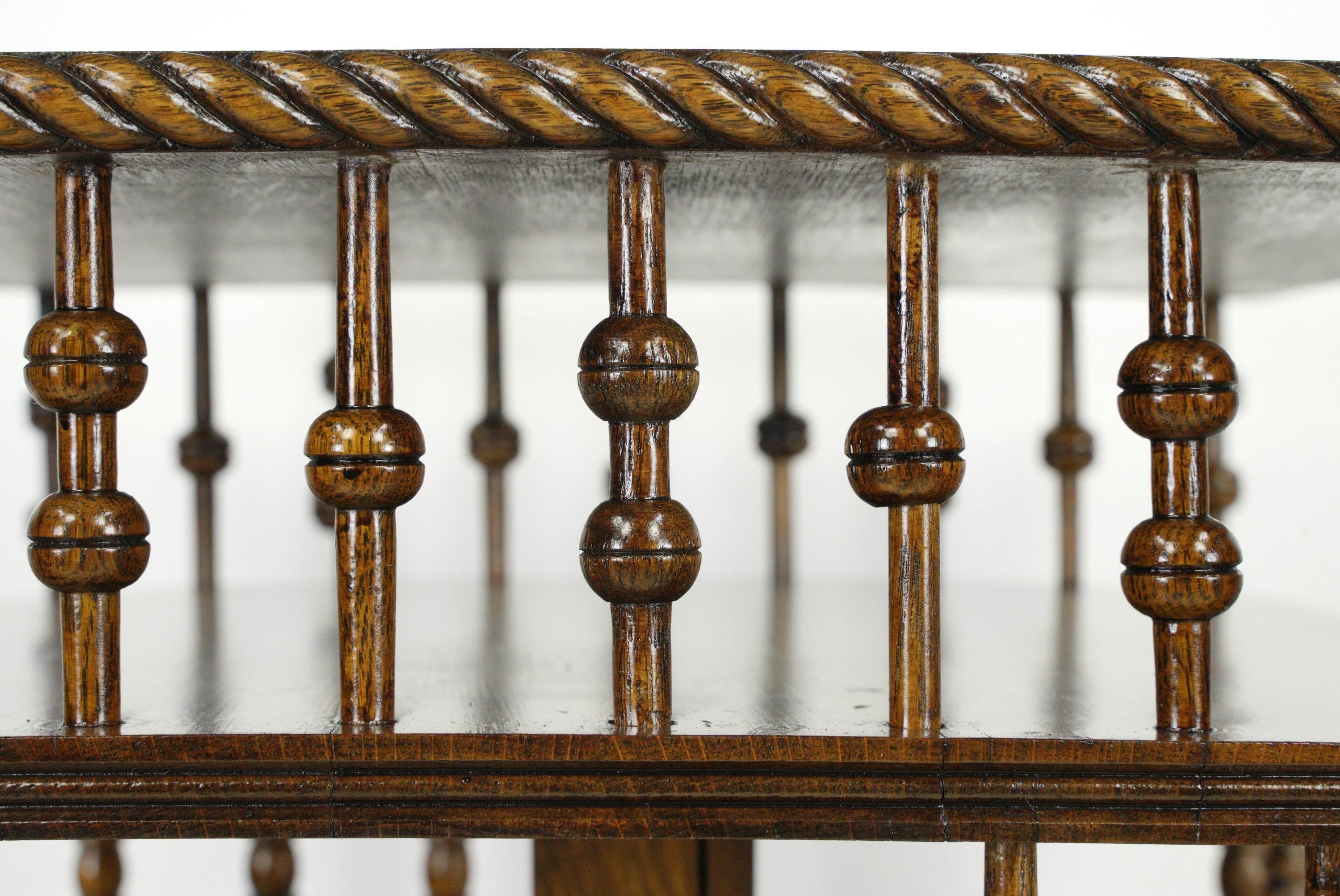 Restored Antique Spindle 3 Tier Revolving Oak Bookcase In Good Condition For Sale In New York, NY