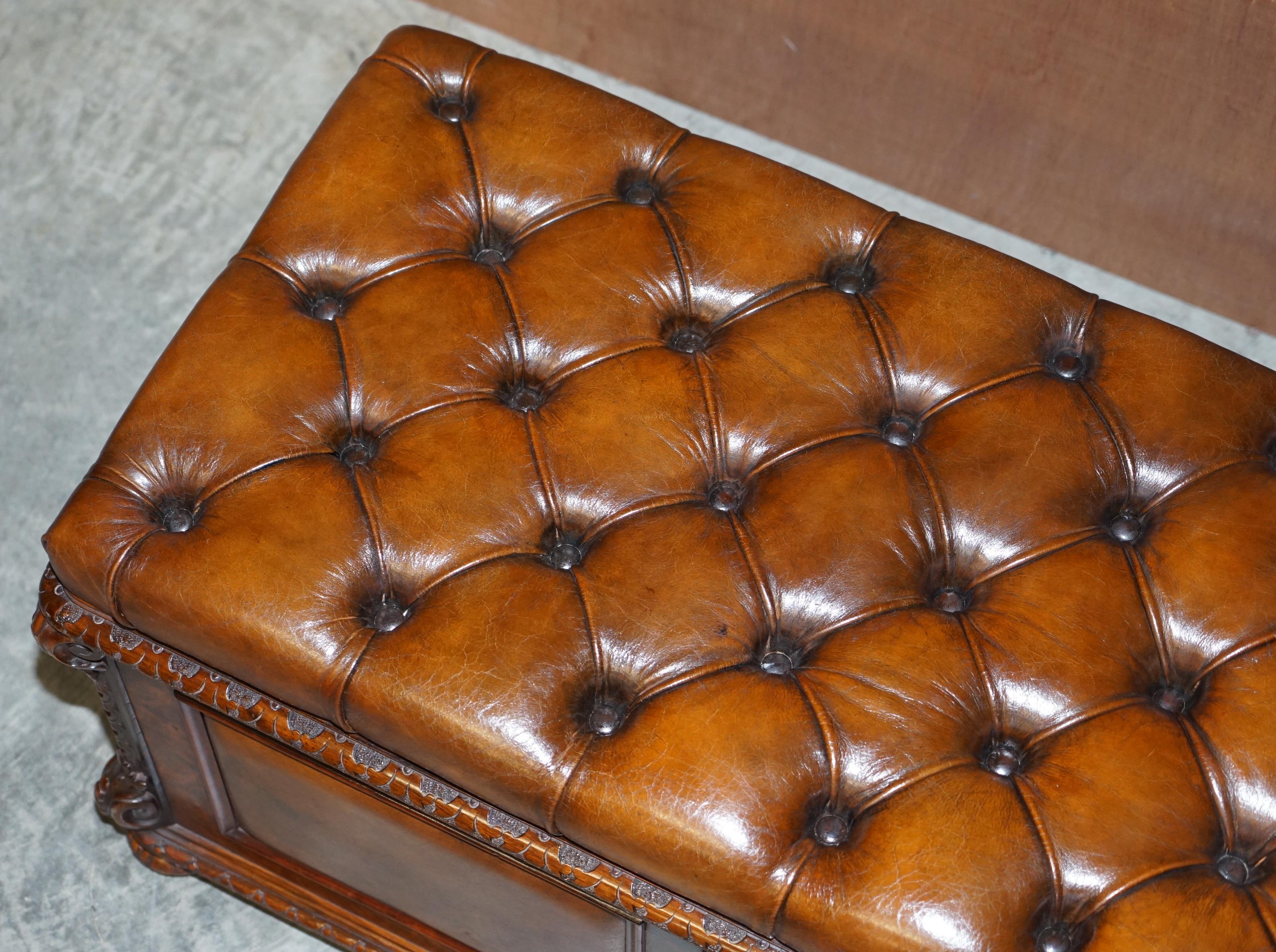 We are delighted to offer this absolutely exquisite two-person large ottoman that has been fully restored in Burr Walnut with brown leather panels and Chesterfield tufting

This is the finest ottoman you will ever come across, restored to a
