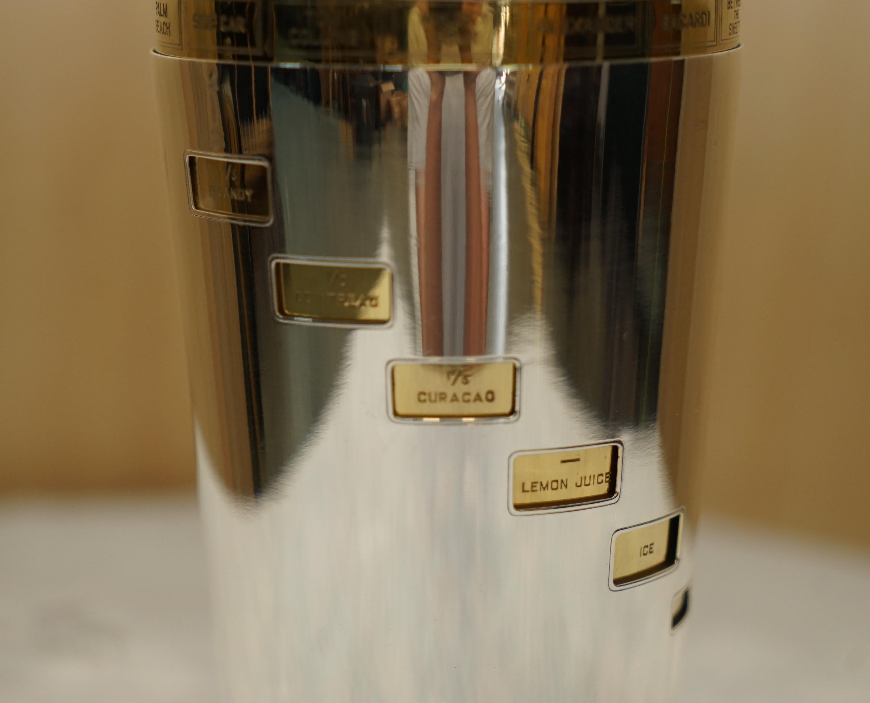 Mid-20th Century Restored Art Deco 1930's Napier Usa Silver Gold Gilt Tells-u-how Cocktail Shaker