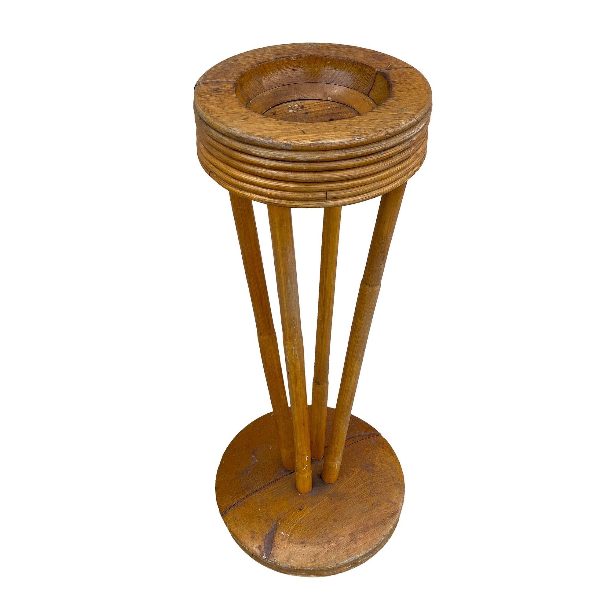 This beautifully restored Paul Frankl-inspired Art Deco bespoke carved Koa wood and rattan smoke stand featuring a hand-carved sculpted Koa wood ashtray holder and base with matching streamlined speed lines rings carved into the sides of each. They