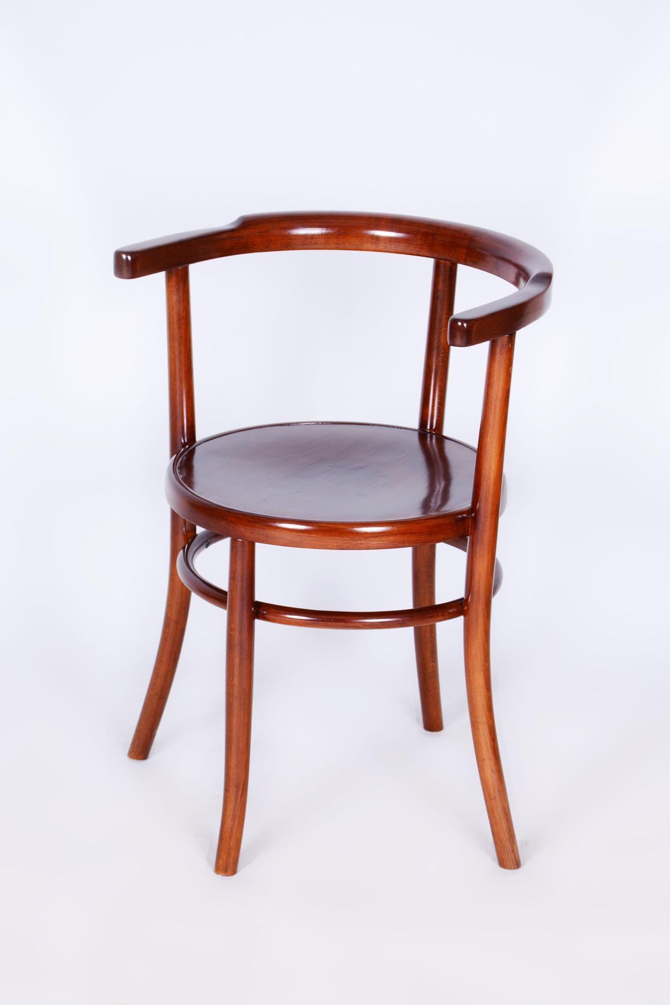 This elegant Art Deco chair comes from Czechoslovakia from the first half of the 20th century. It is made of solid beech wood and is marked Thonet.

The chair has undergone careful restoration, during which its original shine and elegance were