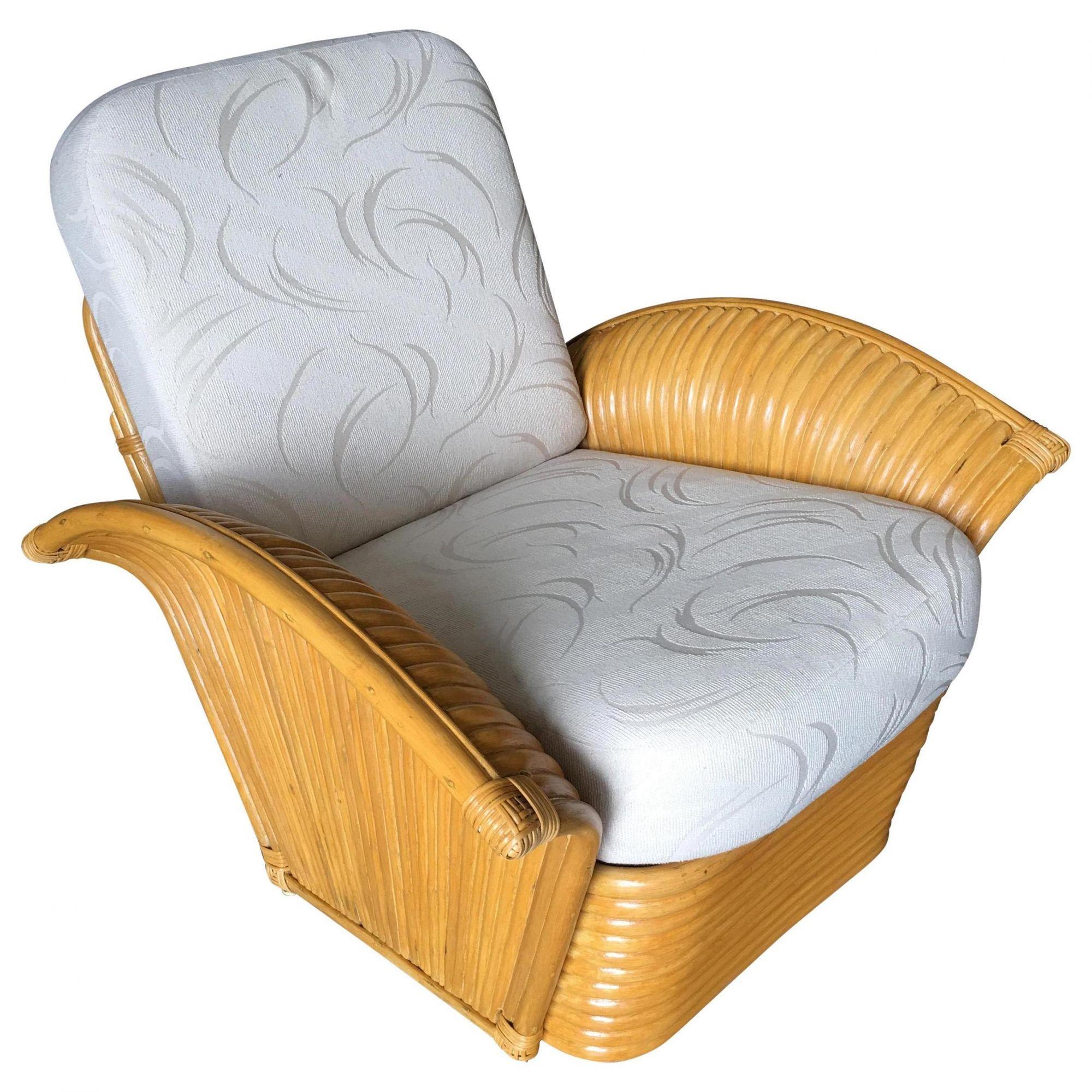 Original rattan fan arm lounge chair with the white seat covering.

Custom cushions C.O.M. (Costumer's Own Material) are included in the price.

Simply supply the fabric and we have the cushions made for you. If you need help sourcing fabric we