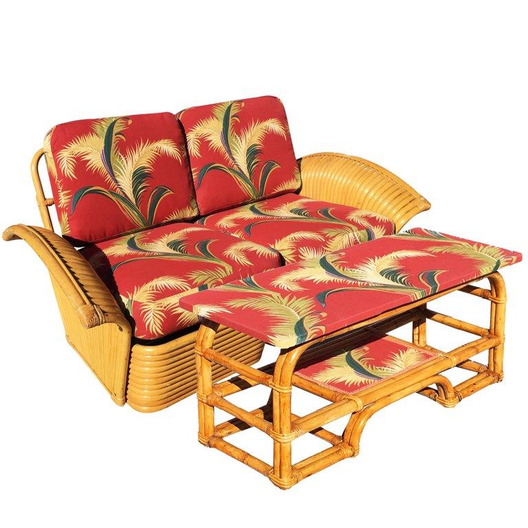 Rare fan arm rattan love seat sofa with matching arched coffee table, circa 1930.

Custom cushions C.O.M. (Costumers Own Material) are included in the price. Simply supply the fabric and we have the cushions made for you. If you need help sourcing