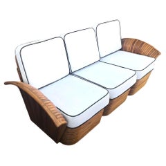 Restored Art Deco Rattan "Fan Arm" Three-Seat Section Sofa w/ Stacked Base