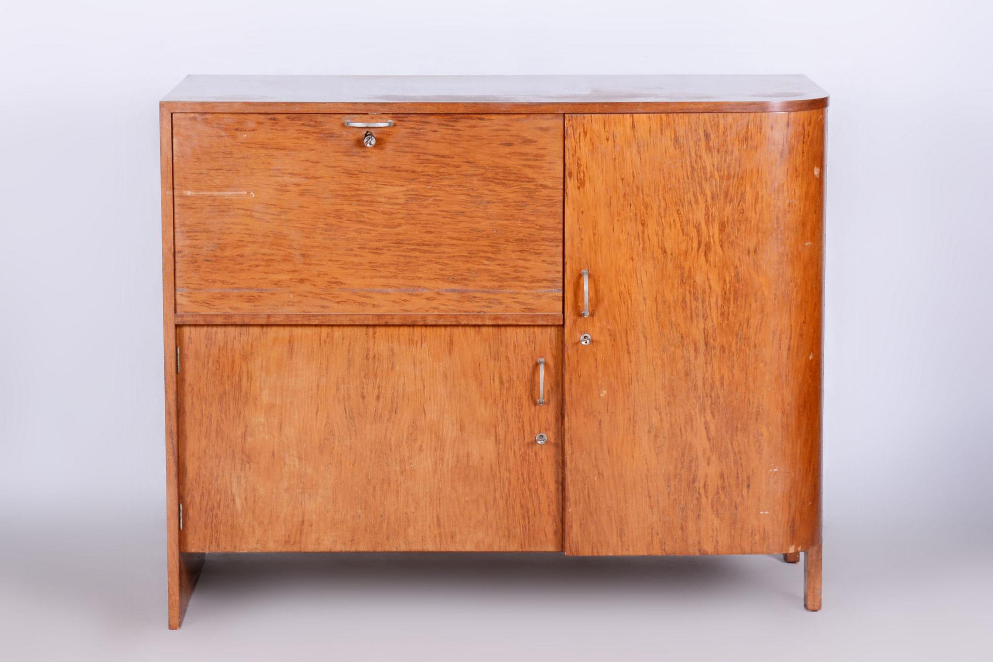 French Art Deco sideboard.
Material: Palisander
Period: 1920-1929

It has been re-polished with polyutherane piano lacquer by our professional refurbishing team in Czechia according to the original process.								

Our professional refurbishing