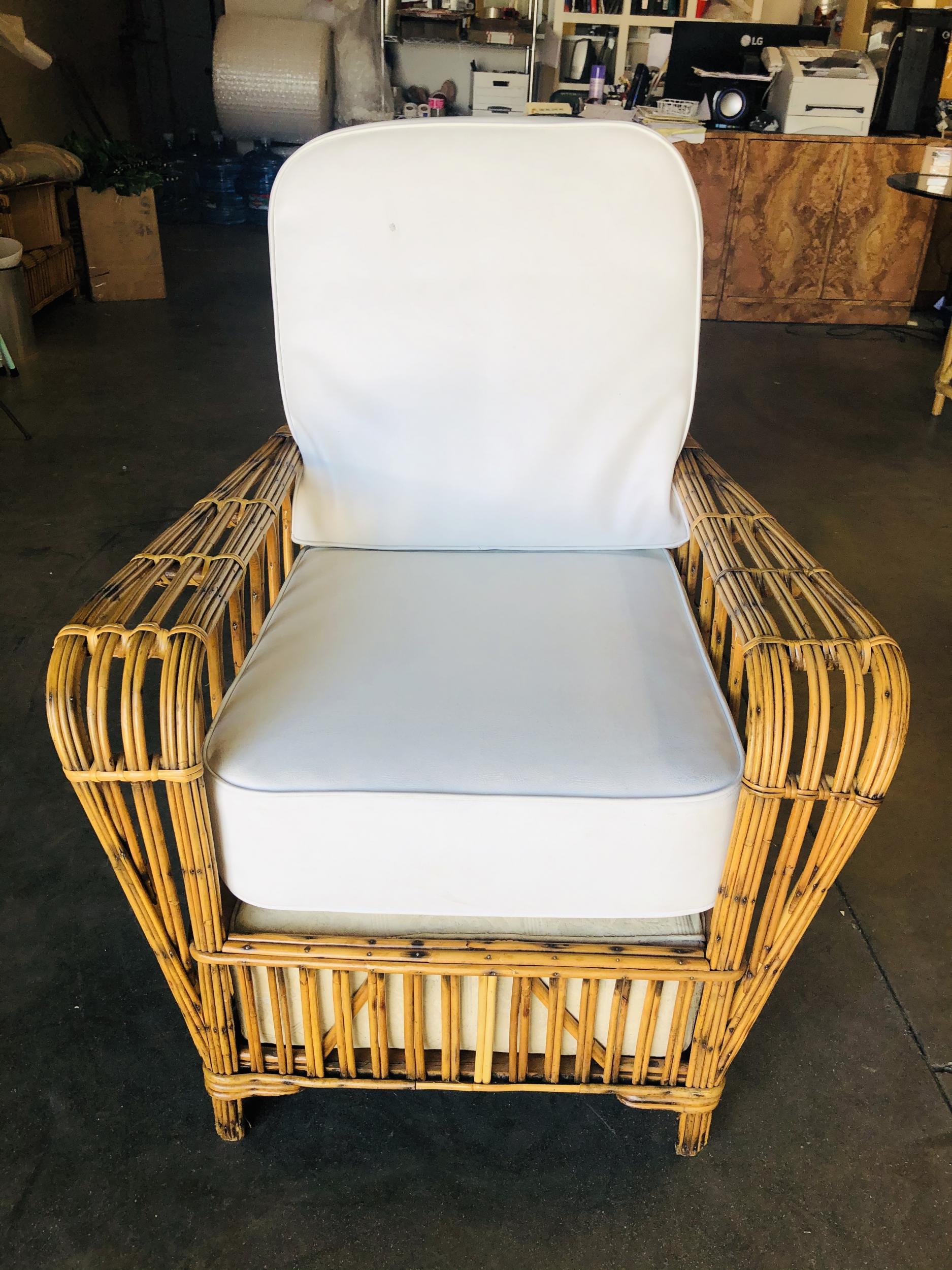 This Art Deco era rattan lounge chair with multi-strand stick rattan arms forming a Gothic cathedral style arches along the side with a tombstone seat back.

Custom cushions are included in the price. Simply supply the fabric and we have the