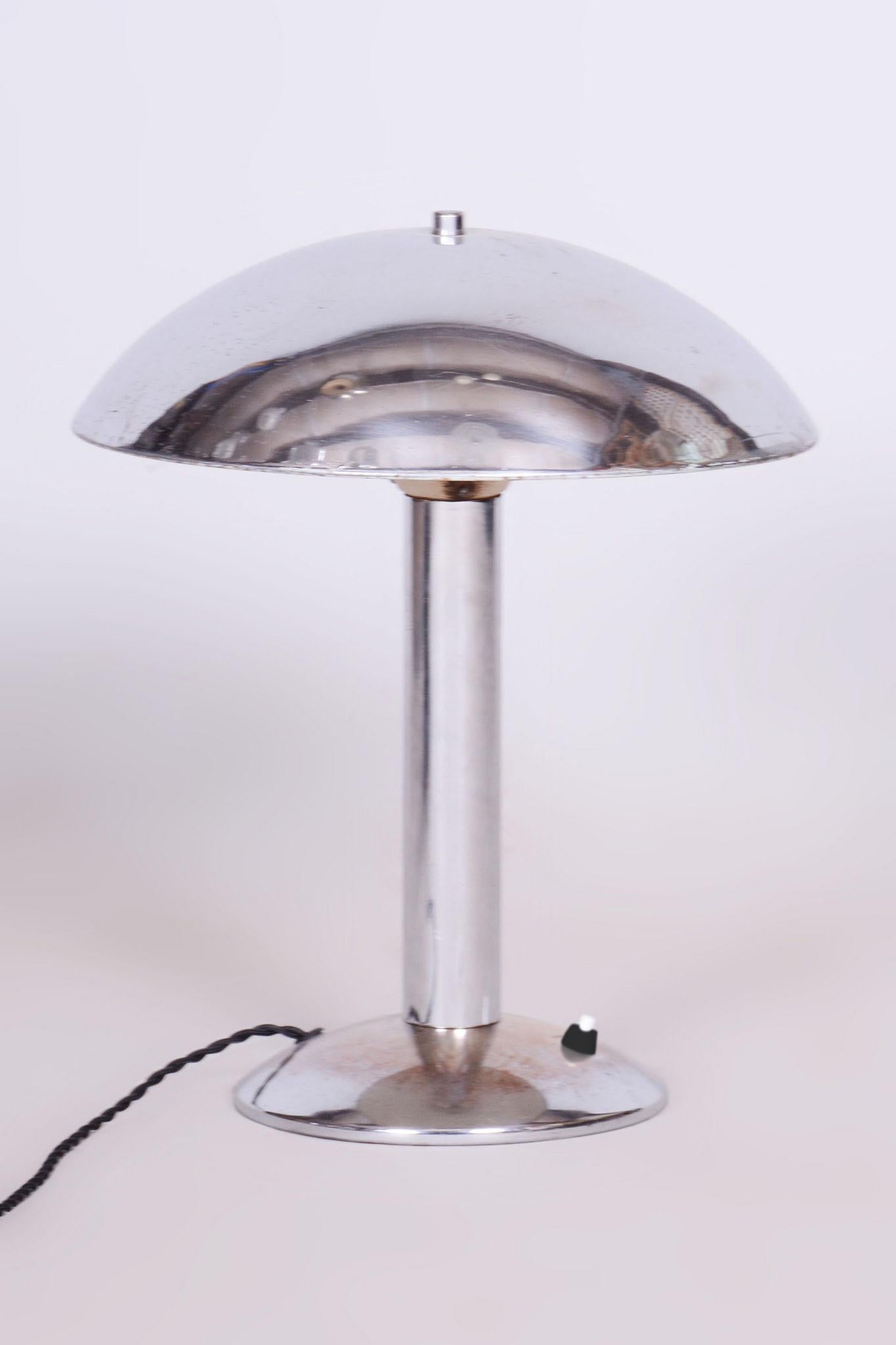Restored Art Deco Table Lamp.

Material: Chrome-plated Steel
Source: Czech
Period: 1930-1939

The chrome parts have been cleaned and professionally restored. 

This item has new fully functioning electrification.

Made by Napako. The NAPAKO