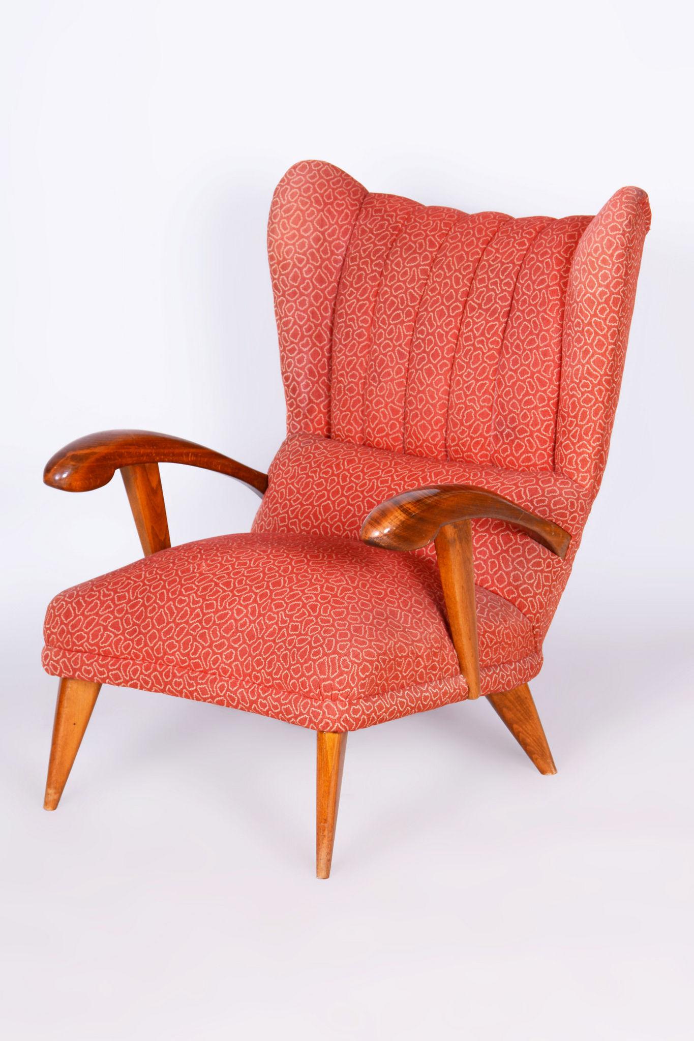 The very comfortable and popular armchair was designed by the architect Jan Vaněk in the early period of his work.
The traditional spring upholstery is original, well-preserved and unseated. The cover fabric designed by Professor Antonín Kybal is
