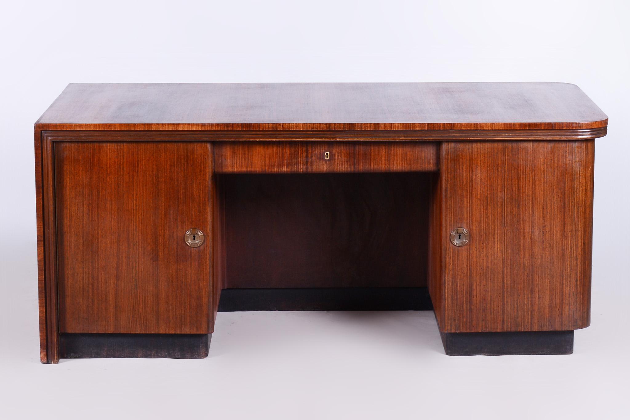 Restored Art Deco writing desk, Germany, 1930s

Revived Polish
Material: Palisandr

Measures: Leg space:
Height: 59 cm (23.2 in)
Width: 70.5 cm (27-8 in)
Depth: 57 cm (22.4 in).
