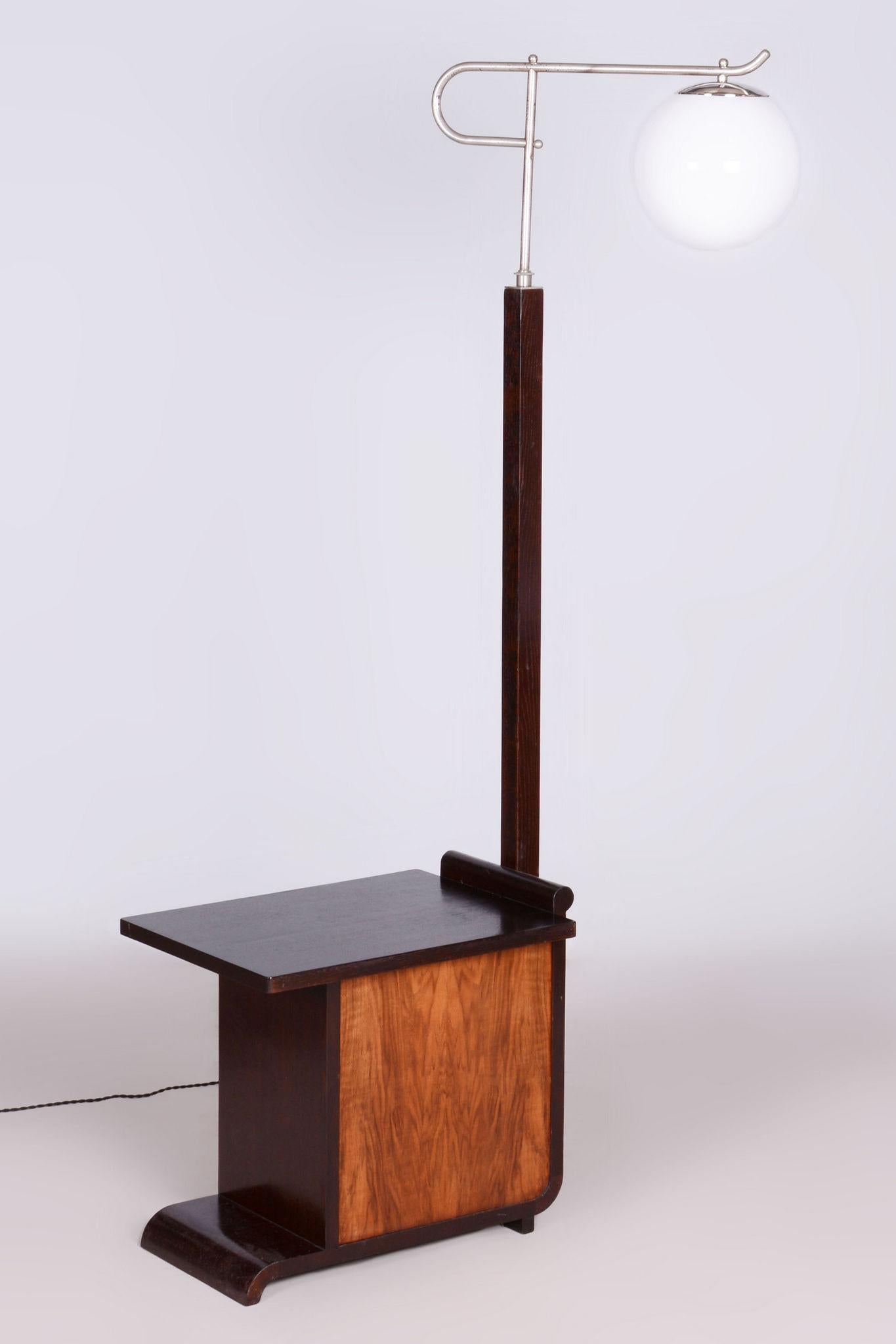 Restored ArtDeco Floor Lamp Designed By Jindrich Halabala. New Electrification.

Designer: Jindrich Halabala
Maker: UP Zavody
Material: Oak, Walnut, Chrome-plated Steel, Milk Glass
Source: Czechia 
Period: 1930-1939

New electrification.
Revived