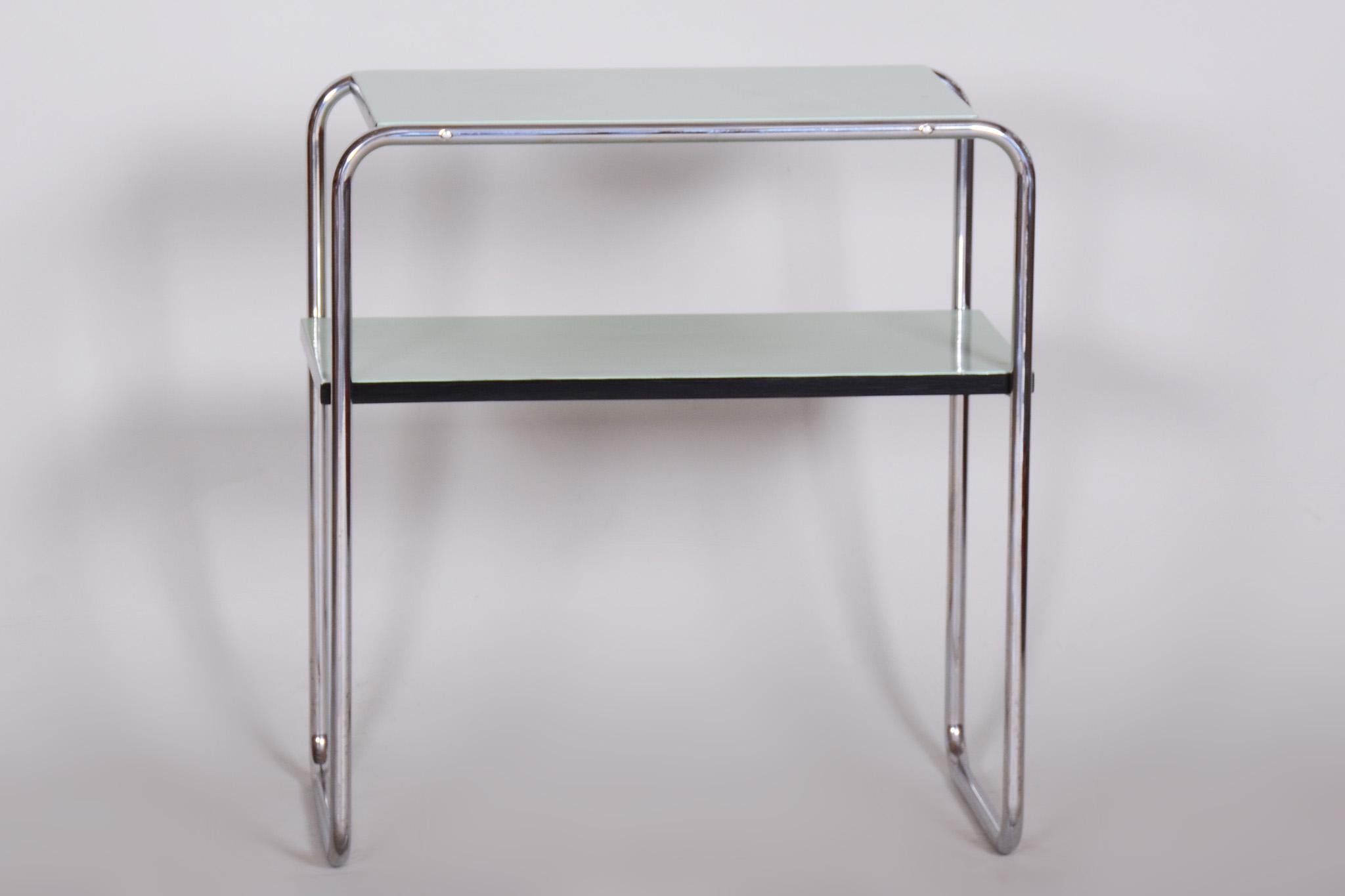 Restored Art Deco side table

Designer: Marcel Breuer
Maker: Thonet
Period: 1930-1939
Source: Germany
Material: Chrome-Plated Steel

Designed by world-renowned German designer, Marcel Breuer.
Made by influential Austrian furniture