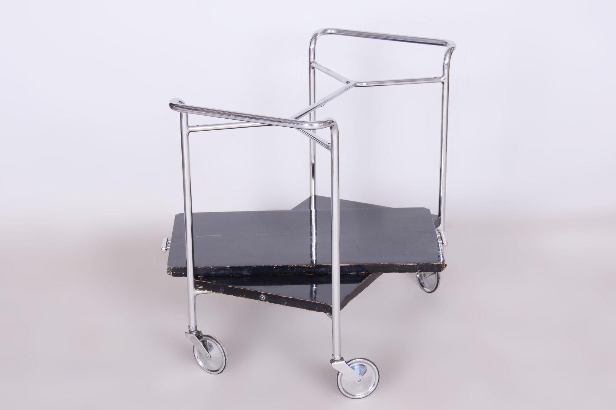 Restored Bauhaus Chrome Trolley Deisgned by Marcel Breuer.

Designer: Marcel Breuer
Maker: Mücke - Melder
Material: Chrome-plated Steel, Lacquered Wood
Source: Czechia 
Period: 1930-1939
The upper removable plate serves as a portable serving