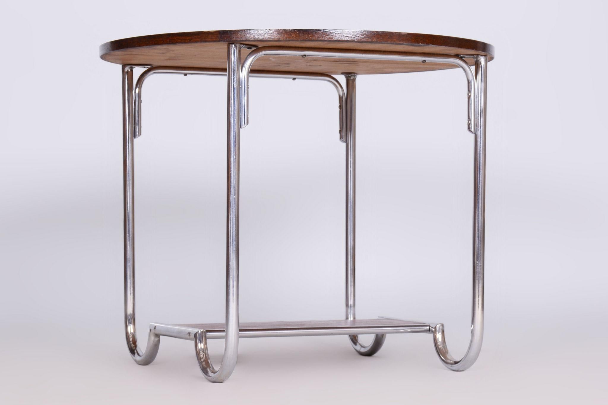 Restored Bauhaus Oak Small Round Table

Period: 1930-1939
Source: Czechia (Czechoslovakia)
Material: Oak, Chrome-Plated Steel

Revived polish.
The chrome parts have been cleaned and professionally restored. 

This item features classic Bauhaus