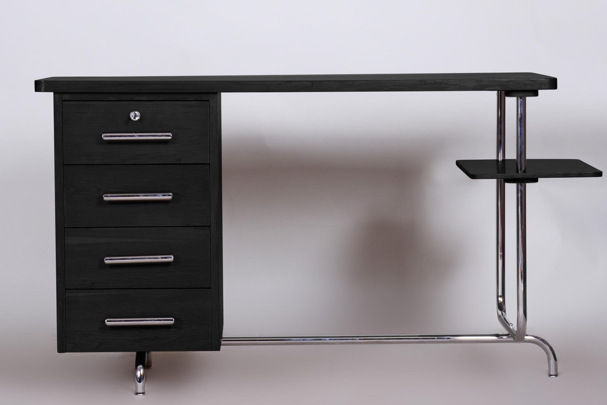 Restored Bauhaus oak writing desk designed by Jindrich Halabala.

Period: 1930-1939.
Source: Czechia.
Maker: UP Zavody.
Material: oak, chrome-plated steel.
Colour: black.

The chrome is in really good condition.
Revived polish.

