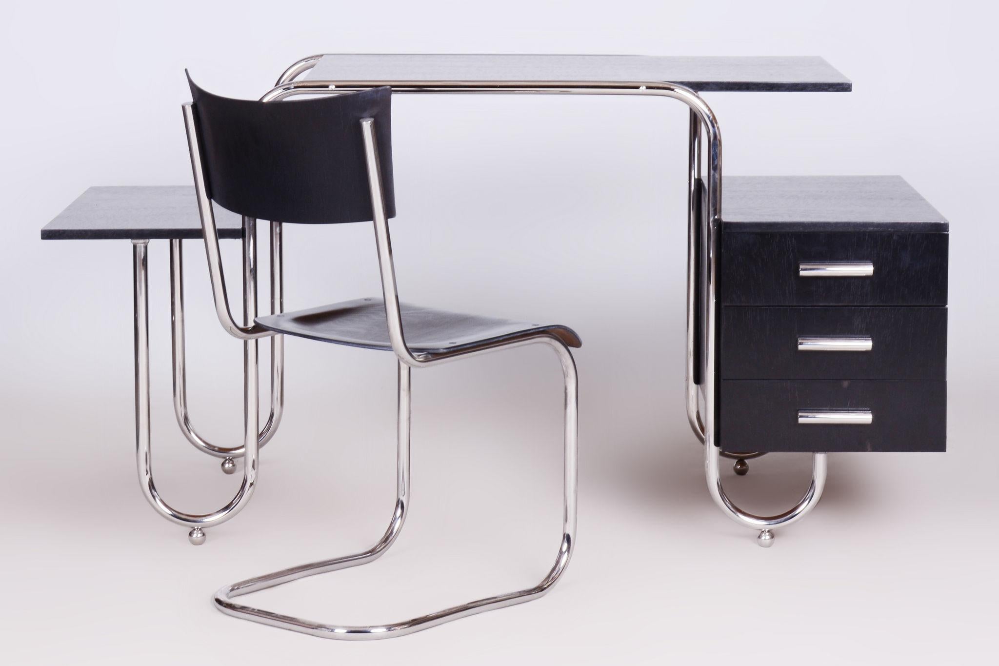 Restored Bauhaus Oak Writing Desk.

Maker: Robert Slezak
Designer: André Lurcat
This desk was designed by French modernist architect André Lurcat
Catalog model: PS 8
Material: Oak, Chrome-plated Steel
Source: Czechia (Czechoslovakia)
Period: