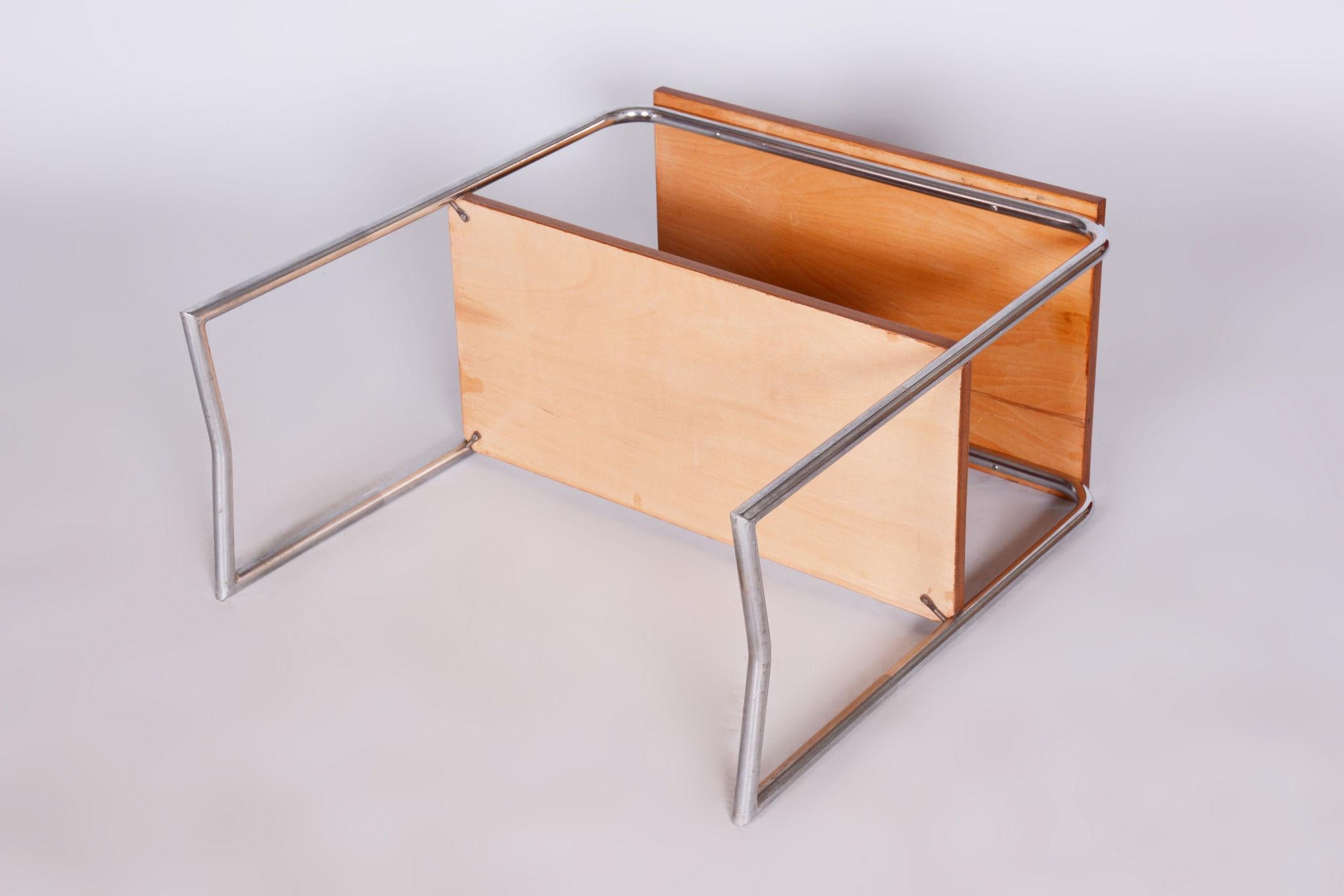 Restored Bauhaus Side Table by Hynek Gottwald

Period: 1930-1939
Maker: Hynek Gottwald
Source: Czechia (Czechoslovakia)
Material: Walnut, Chrome-Plated Steel
Revived polish

Made by Hynek Gottwald, a company credited with being the pioneers of metal