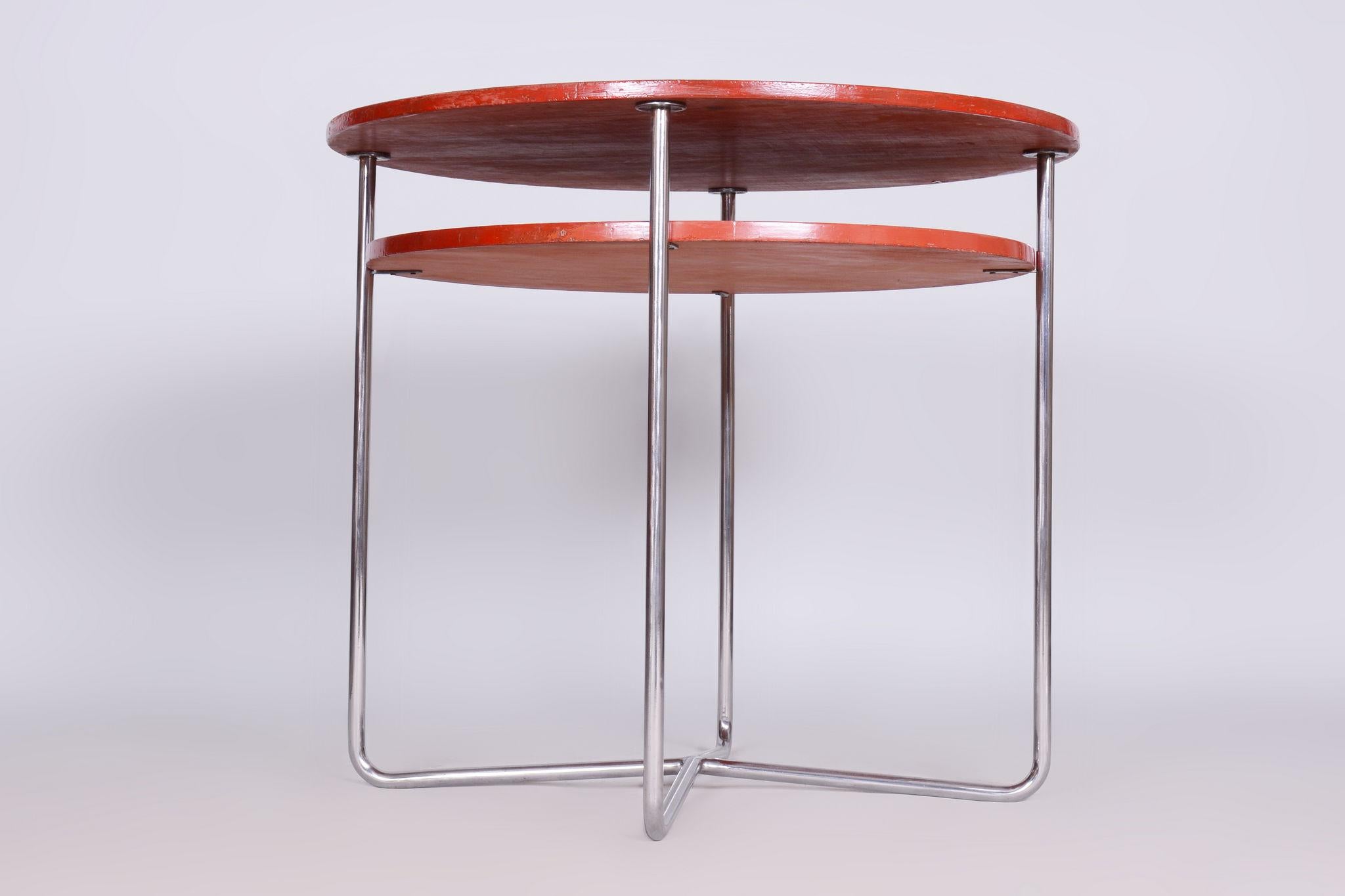 Restored Bauhaus Small Round Table.

Period: 1930-1939
Source: Czechia (Czechoslovakia)
Material: Chrome-Plated Steel, Lacquered Wood

Revived paint.
The chrome parts have been cleaned and professionally restored. 

This item features classic