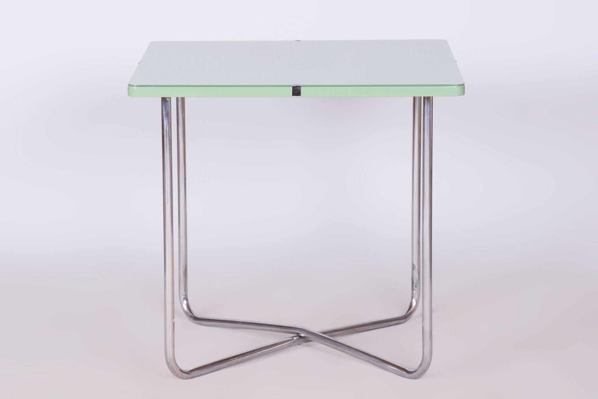 Made by Hynek Gottwald, a company credited with being the pioneers of metal furniture. 

Our professional refurbishing team in Czechia has fully restored it according to the original process. 

The chrome parts have been cleaned and professionally