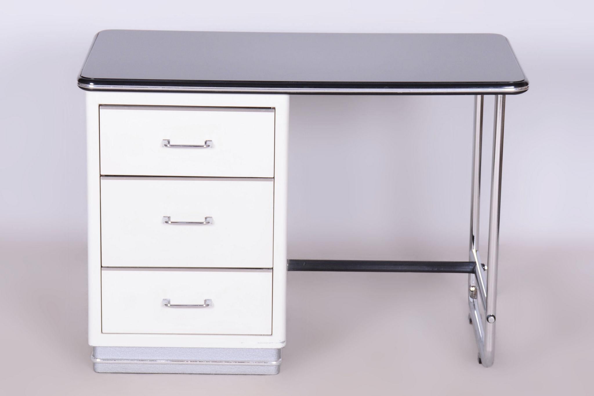 Dimensions of the desk:
Height: 70 cm (27.6 in)
Width: 100 cm (39.4 in)
Depth: 55 cm (21.7 in)

Leg space:
Height: 67.5 cm (26.6 in)
Width: 45 cm (17.7 in)

Our professional refurbishing team in Czechia has fully restored it according to the