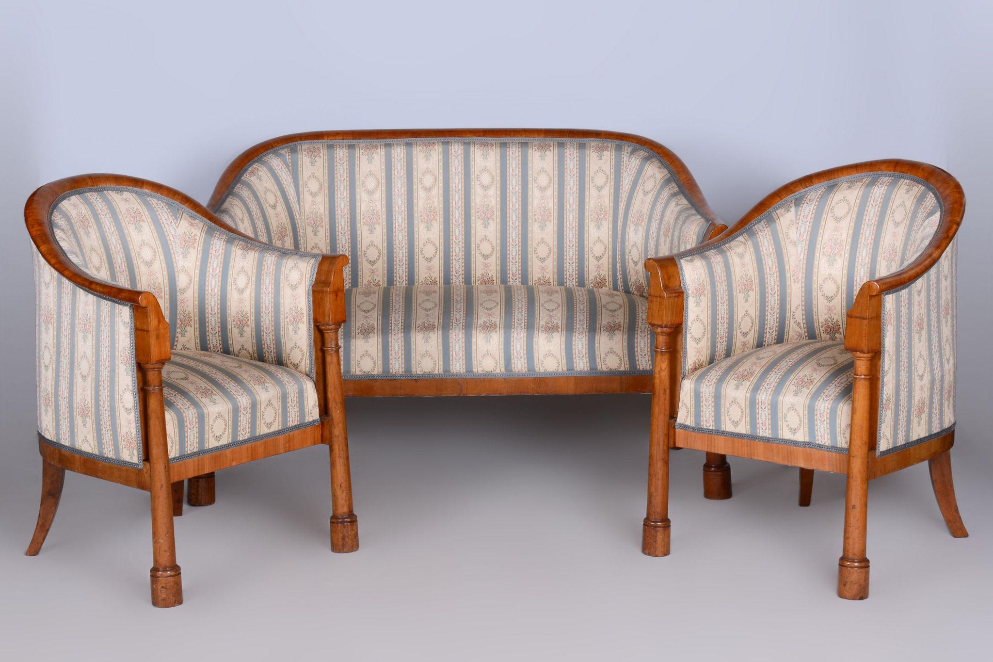 Restored Biedermeier Birch Seating Set of Sofa and Two Chairs. 

Source: Vienna, Austria
Period: 1830-1839
Material: Birch

Revived polish.
Preserved unseated original upholstery.
Professionally cleaned original fabric.

Sofa dimensions:
Height: