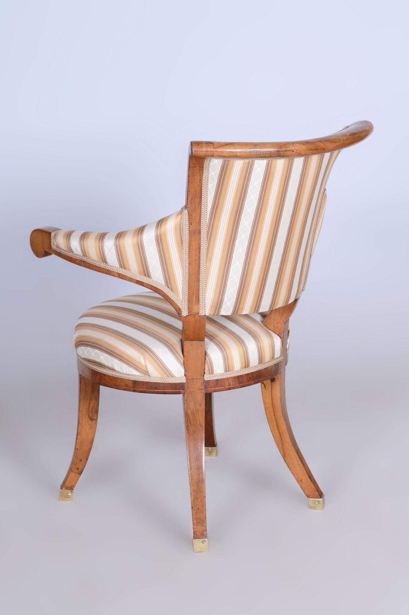 Restored Biedermeier Walnut Armchair attributed to Josef Danhauser.

Source: Vienna, Austria
Period: 1820-1829
Material: Walnut
Revived polish.
New professional upholstery.
Seat height: 40 cm / 15.75″

Our professional refurbishing team in Czechia