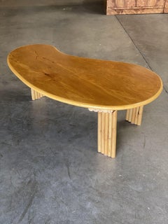 Restored Biomorphic Rattan and Mahogany Coffee Table with Vertically Stacked Leg