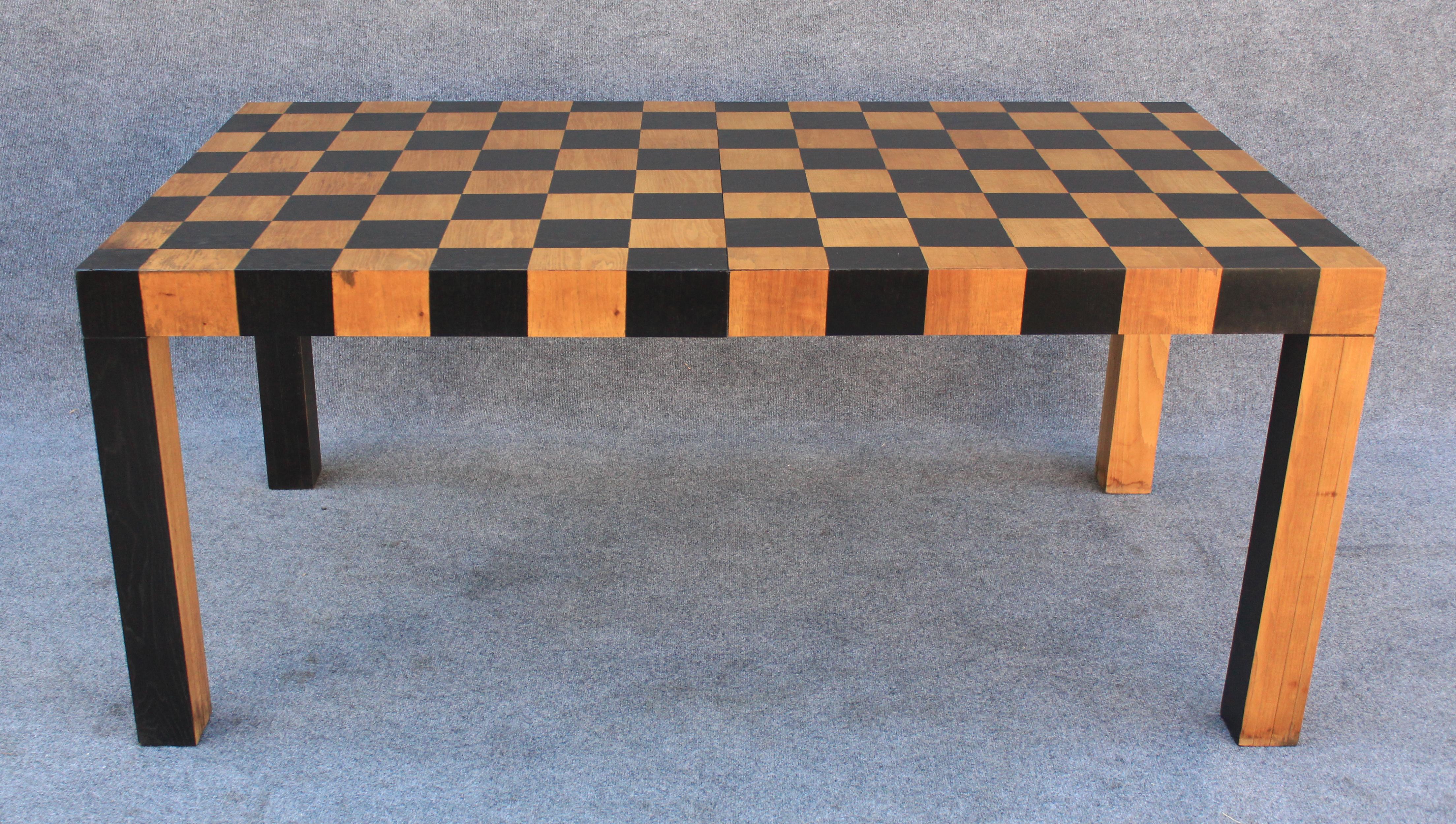 Made towards the late 1970s, this table was manufactured to the exacting standards known of Lane furniture in a style similar to the popular Milo Baughman tables. The entire table is clad in an 8 x 14 grid of walnut squares, with an additional 8 x 4